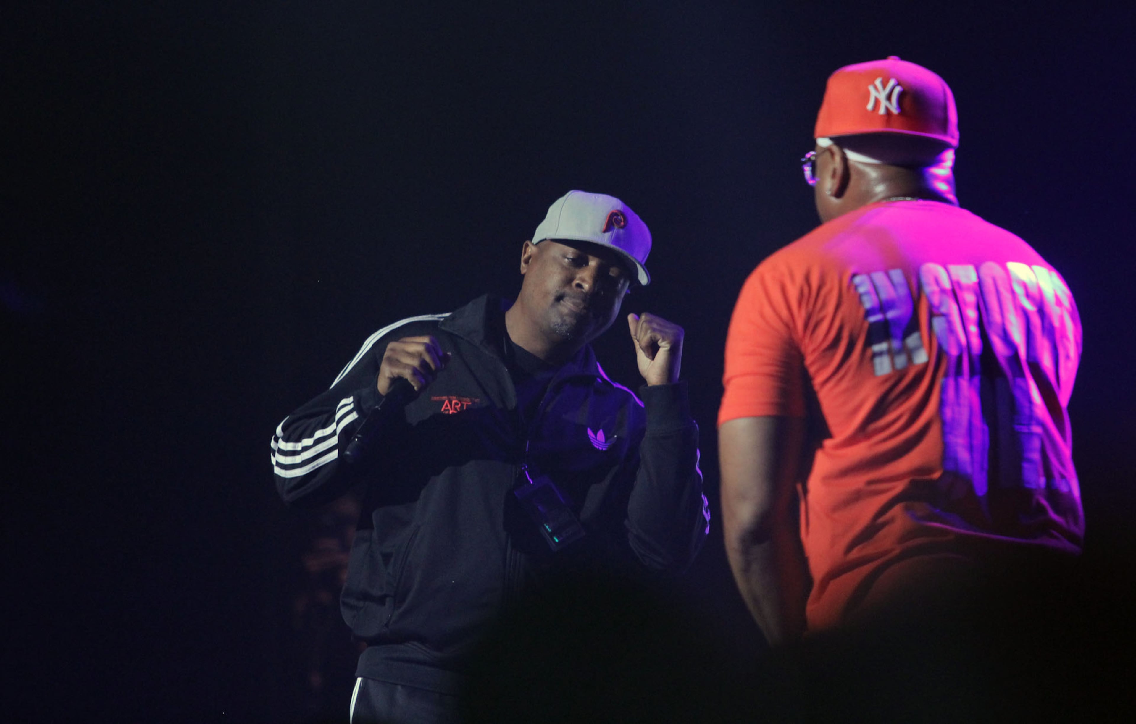 Public Enemy's Chuck D joins LL Cool J on the stage during his closing set of the Kings of the MIC Tour that featured hip-hop and rap pioneers De La Soul, Public Enemy, Ice Cube and LL Cool J at the Fox Theatre in Atlanta Tuesday, June 4, 2013.