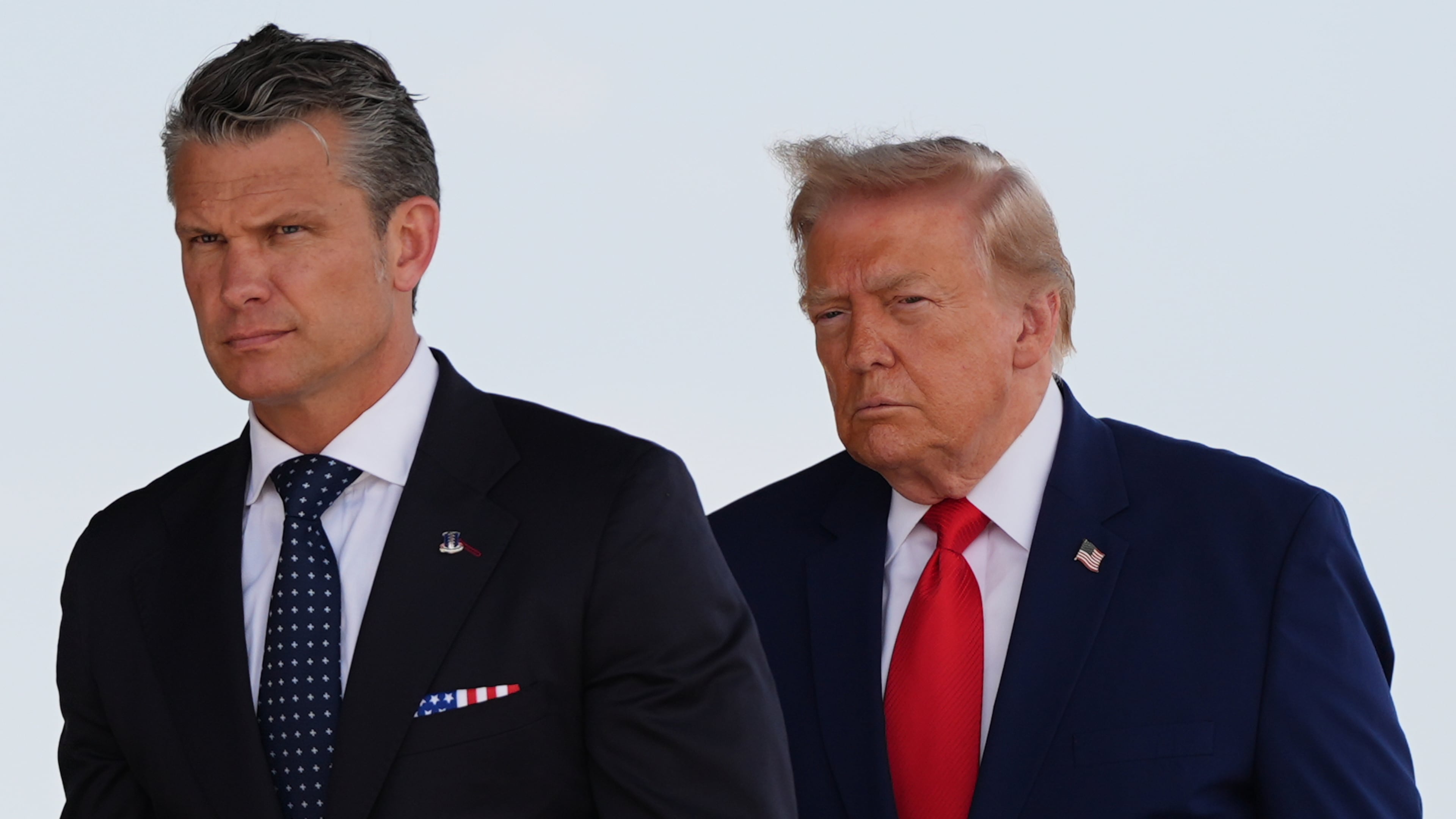 Defense Secretary Pete Hegseth and President Donald Trump attend the dignified transfer of four U.S. service members recently killed in the Middle East, Wednesday, July 22, 2026, at Dover Air Force Base, Del. (AP Photo/Julia Demaree Nikhinson)