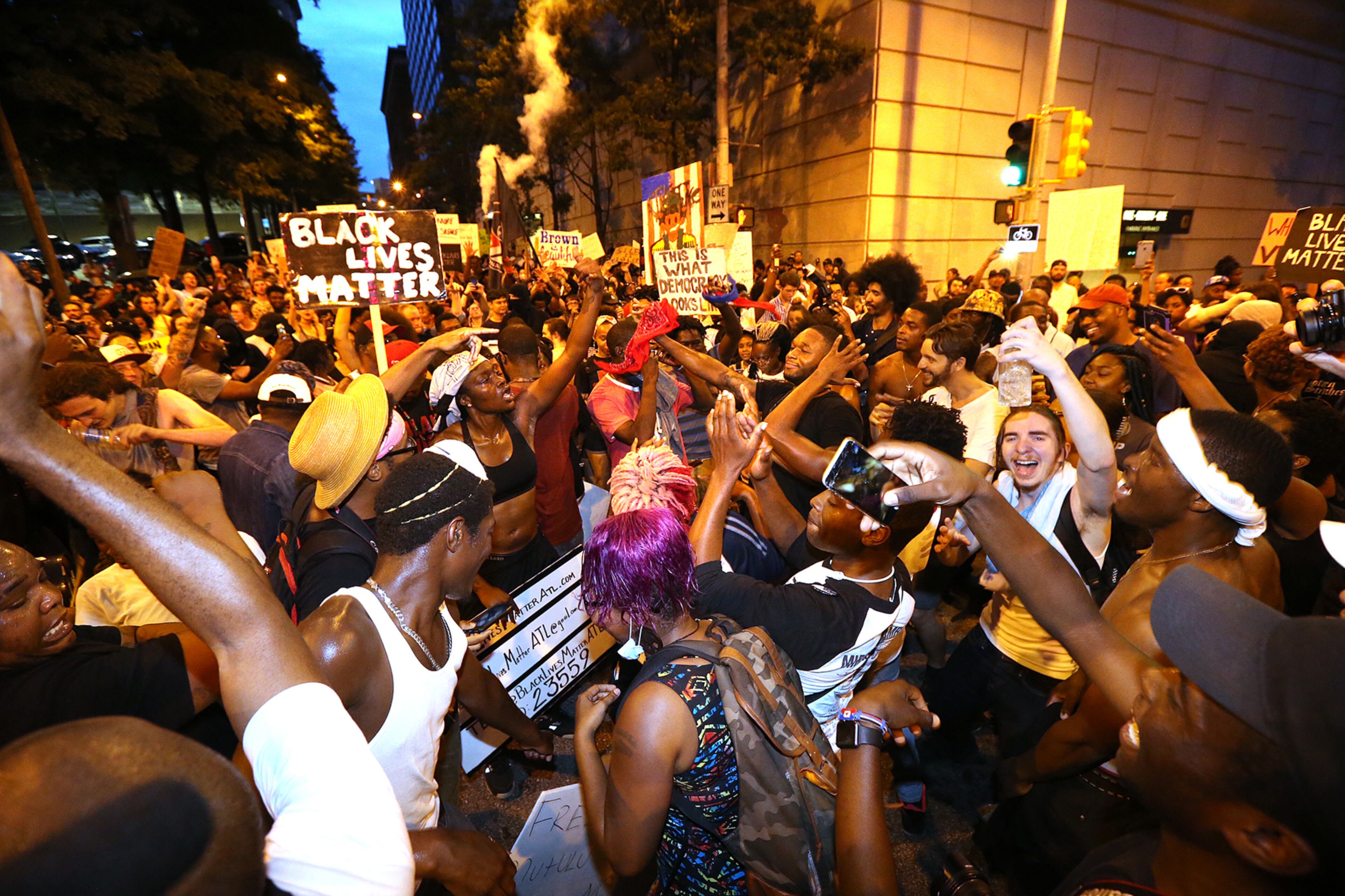 071016 ATLANTA: Hundreds of protesters march through the streets of Atlanta blocking traffic during another night of demonstrations on Sunday, July 10, 2016. Curtis Compton /ccompton@ajc.com