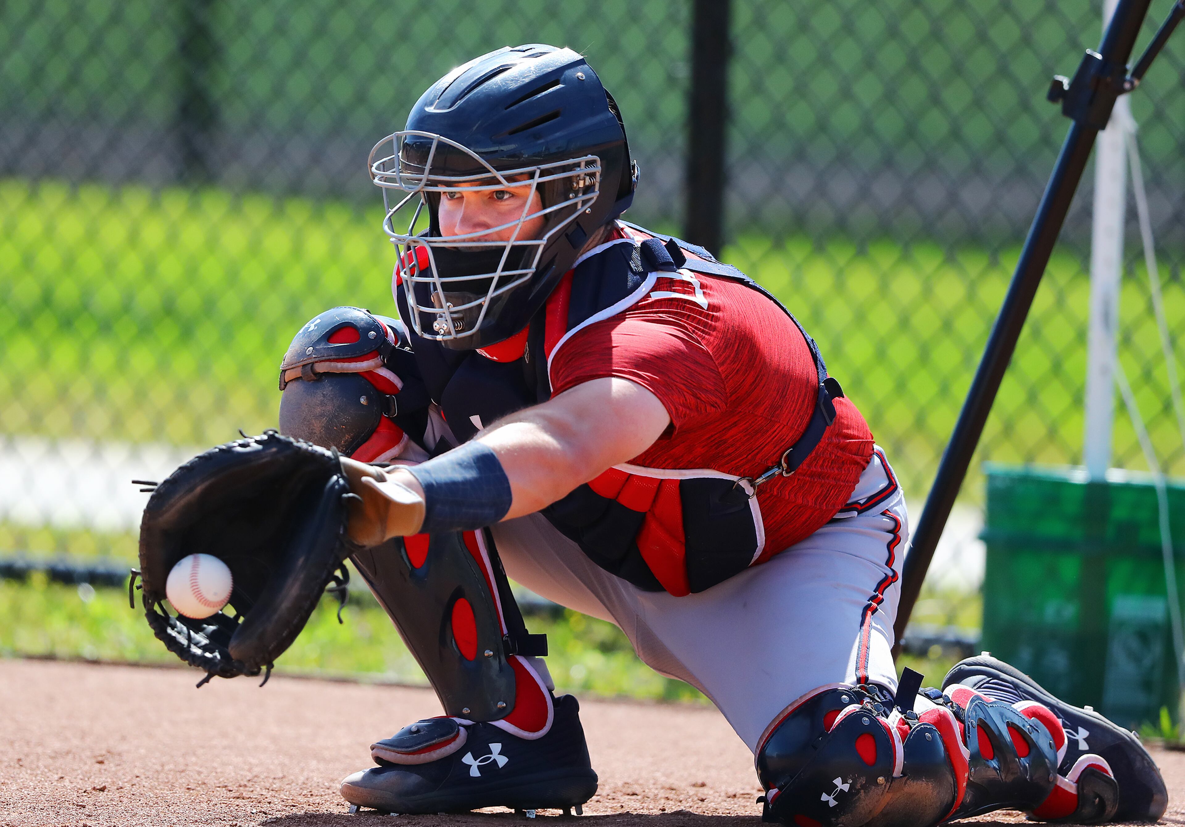 030622 North Port: Atlanta Braves top prospect catcher Shea Langeliers works behind the plate at the practice pitching mounds on the first day of Braves minor league spring training camp on Sunday, March 6, 2022, in North Port. “Curtis Compton / Curtis.Compton@ajc.com”`