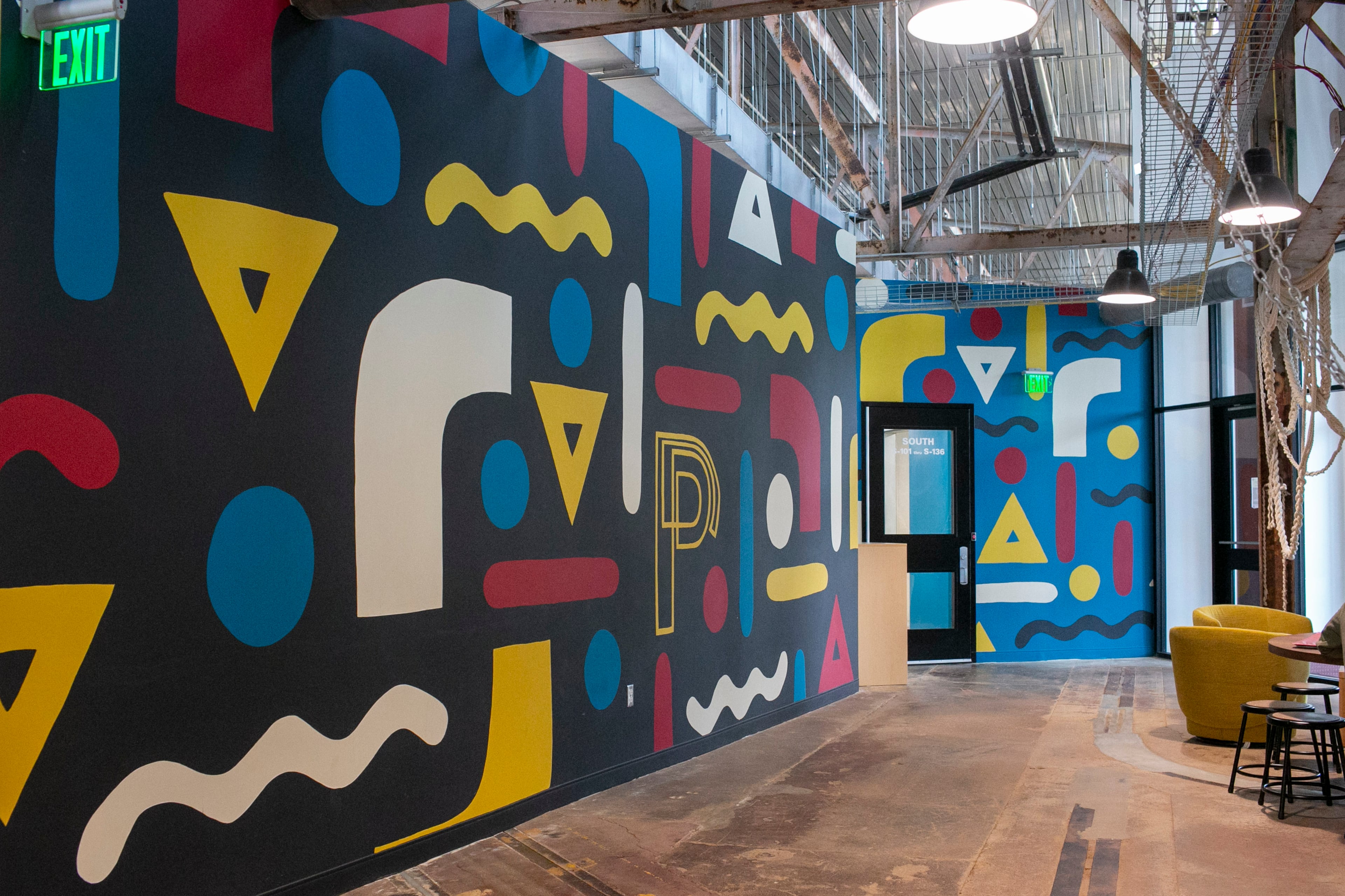 A George F. Baker III mural is seen in the Nia Building. (Rebecca Wright for the Atlanta Journal-Constitution)