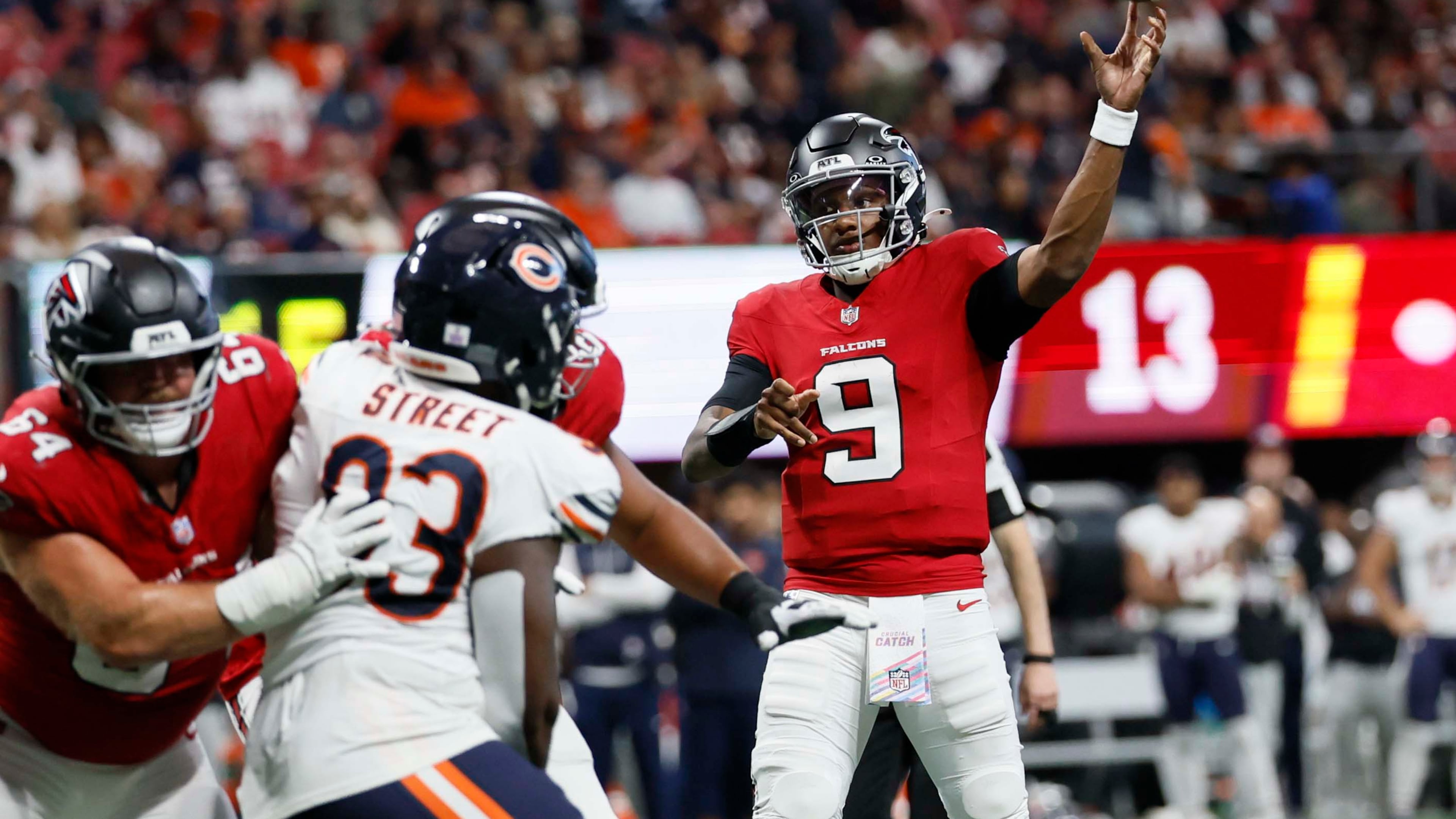 When Falcons quarterback Michael Penix Jr. (right) had time to get passes off against the Bears’ blitzes last week, he went 10-for-18 passing for 121 yards and three touchdowns. (Miguel Martinez/AJC)