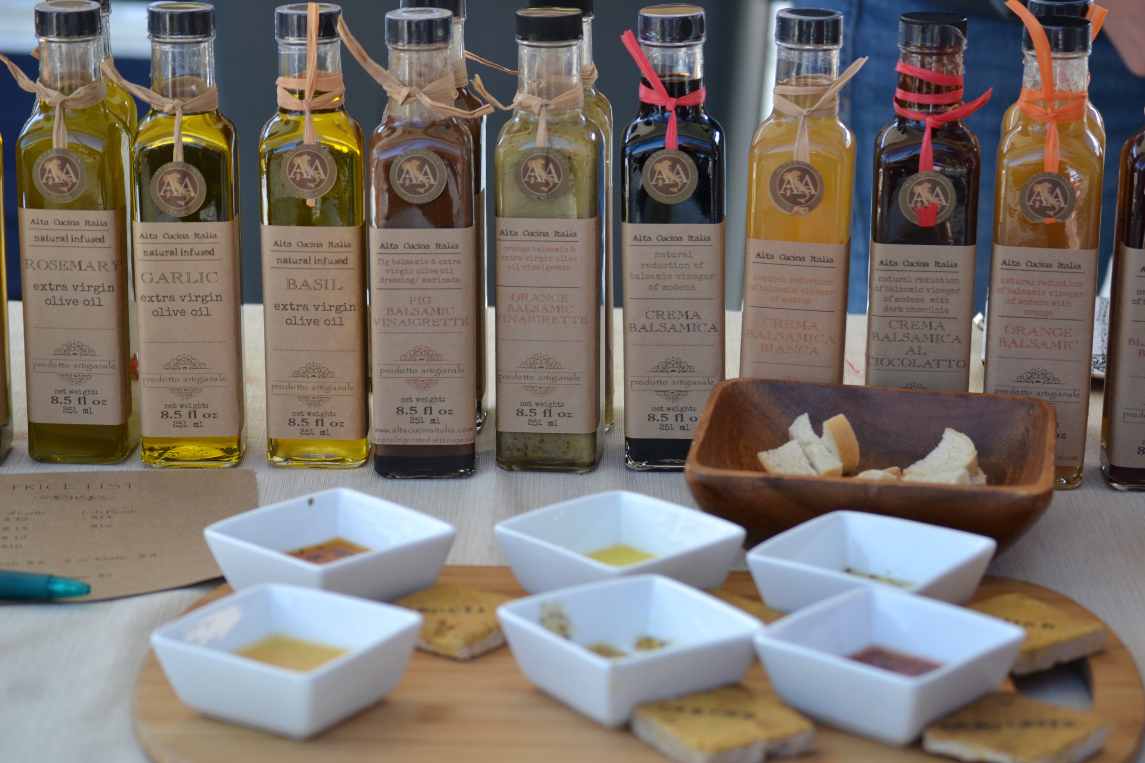Alta Cucina Italia offers samples of its line of olive oils and vinegars at the Marietta Square Farmers Market.