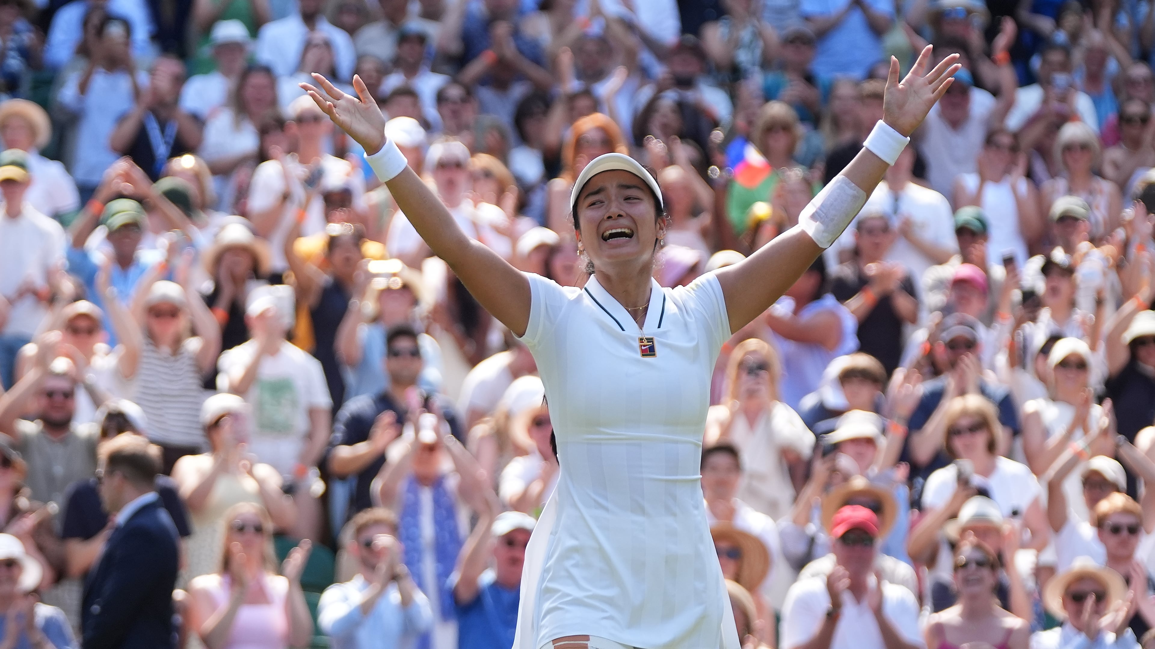 Alexandra Eala of the Philippines celebrates winning the third round women's singles match against Iga Swiatek of Poland at the Wimbledon Tennis Championships in London, Saturday, July 4, 2026.(AP Photo/Maja Smiejkowska)