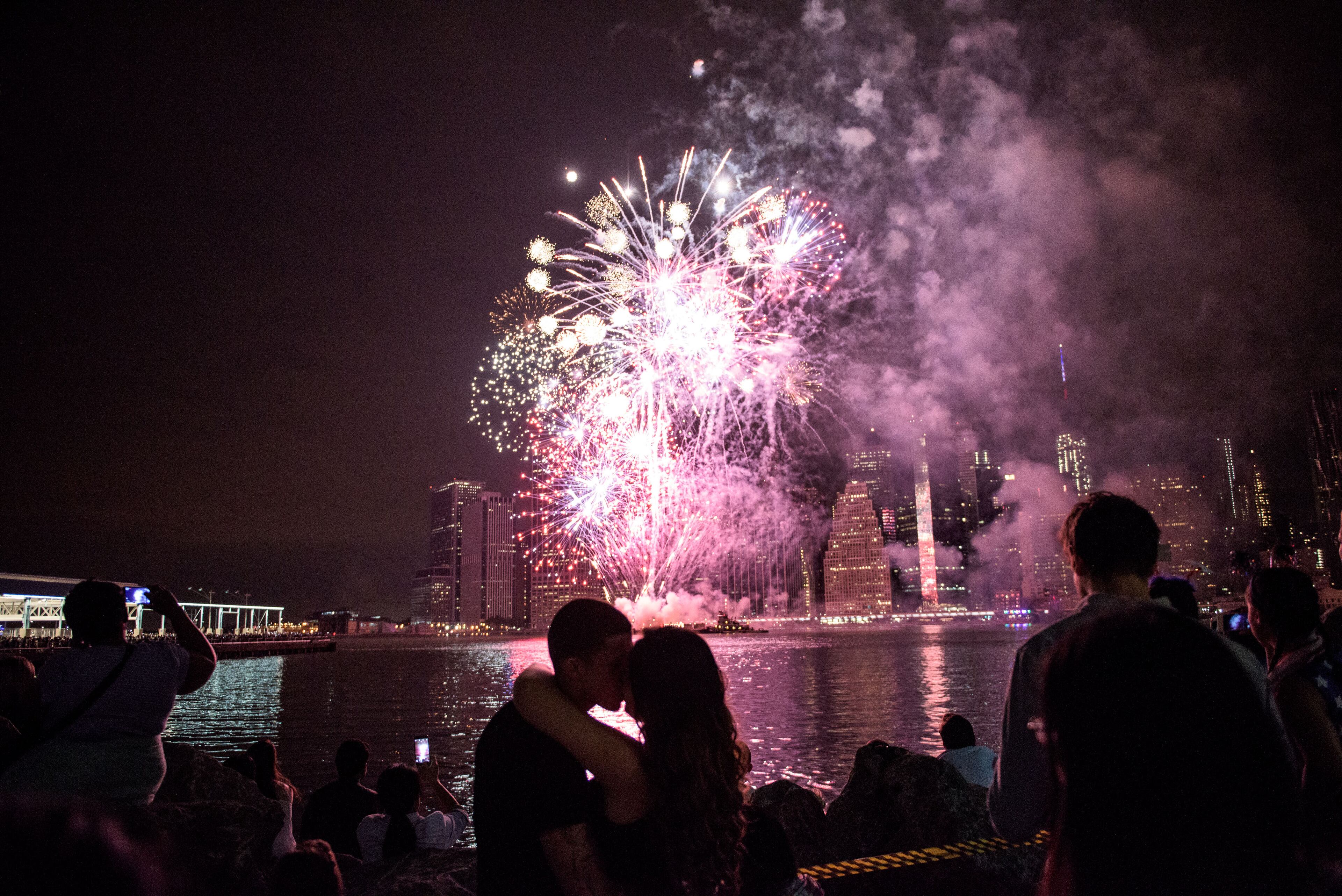 NEW YORK, NY - JULY 4: People watch the Macy's Fourth of July Fireworks from Brooklyn Bridge Park on July 4, 2015 in the Brooklyn borough of New York City. The celebrations mark the nation's 239th Independence Day. (Photo by Andrew Renneisen/Getty Images)