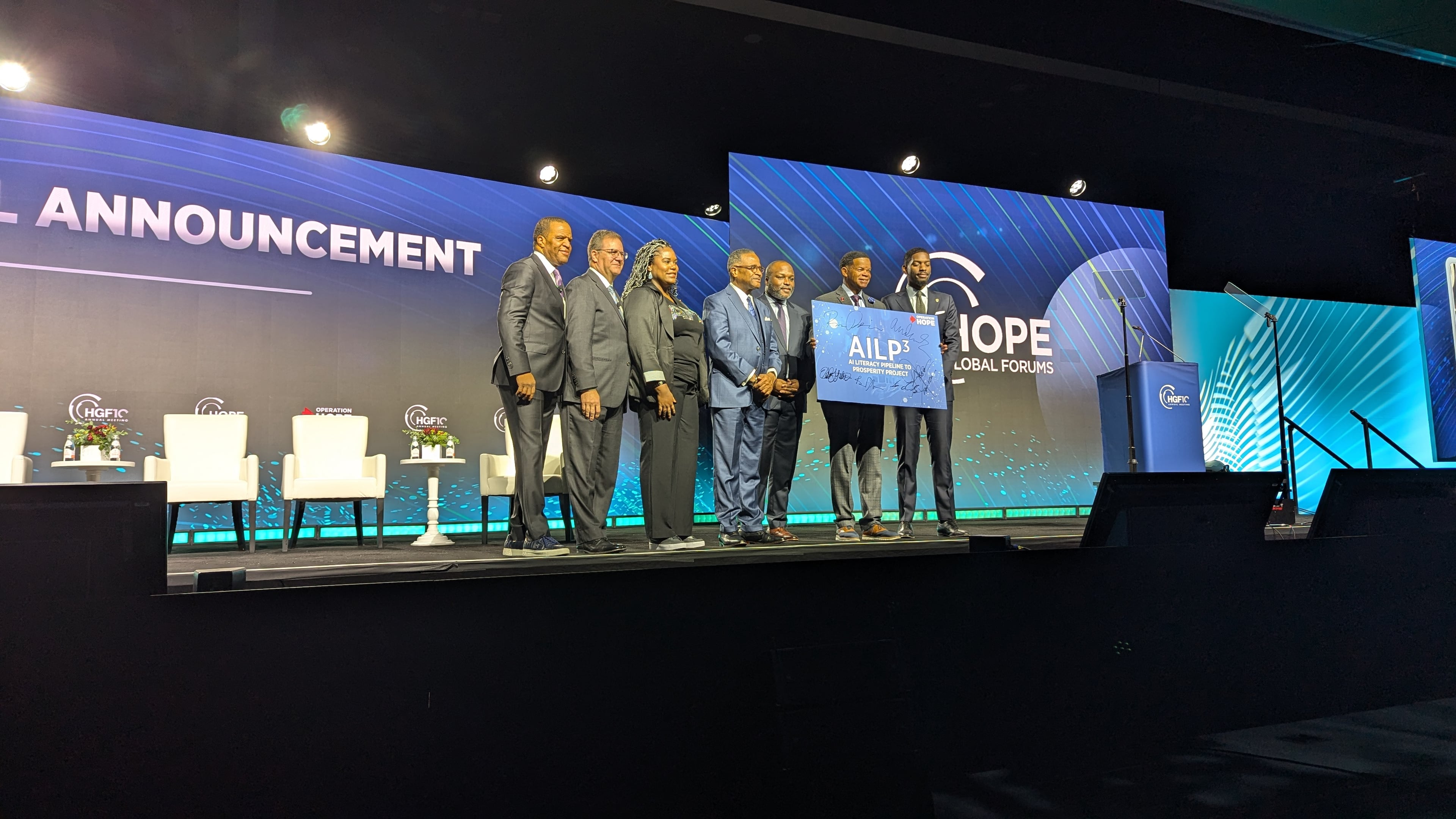 Atlanta leaders sign an agreement to establish the AI Literacy Pipeline to Prosperity Project for students from underserved communities on Wednesday, Dec. 11, 2024, in Atlanta.
From left to right: John Hope Bryant, CEO of Operation HOPE; Richard Phillips, dean of Georgia State University's J. Mack Robinson College of Business; Erika Mitchell, chair of the Atlanta Board of Education; George French, president of Clark Atlanta University; Bryan Johnson, superintendent of Atlanta Public Schools; Lance Triggs, Operation HOPE President of Operations; and a representative from Mayor Andre Dickens' office.