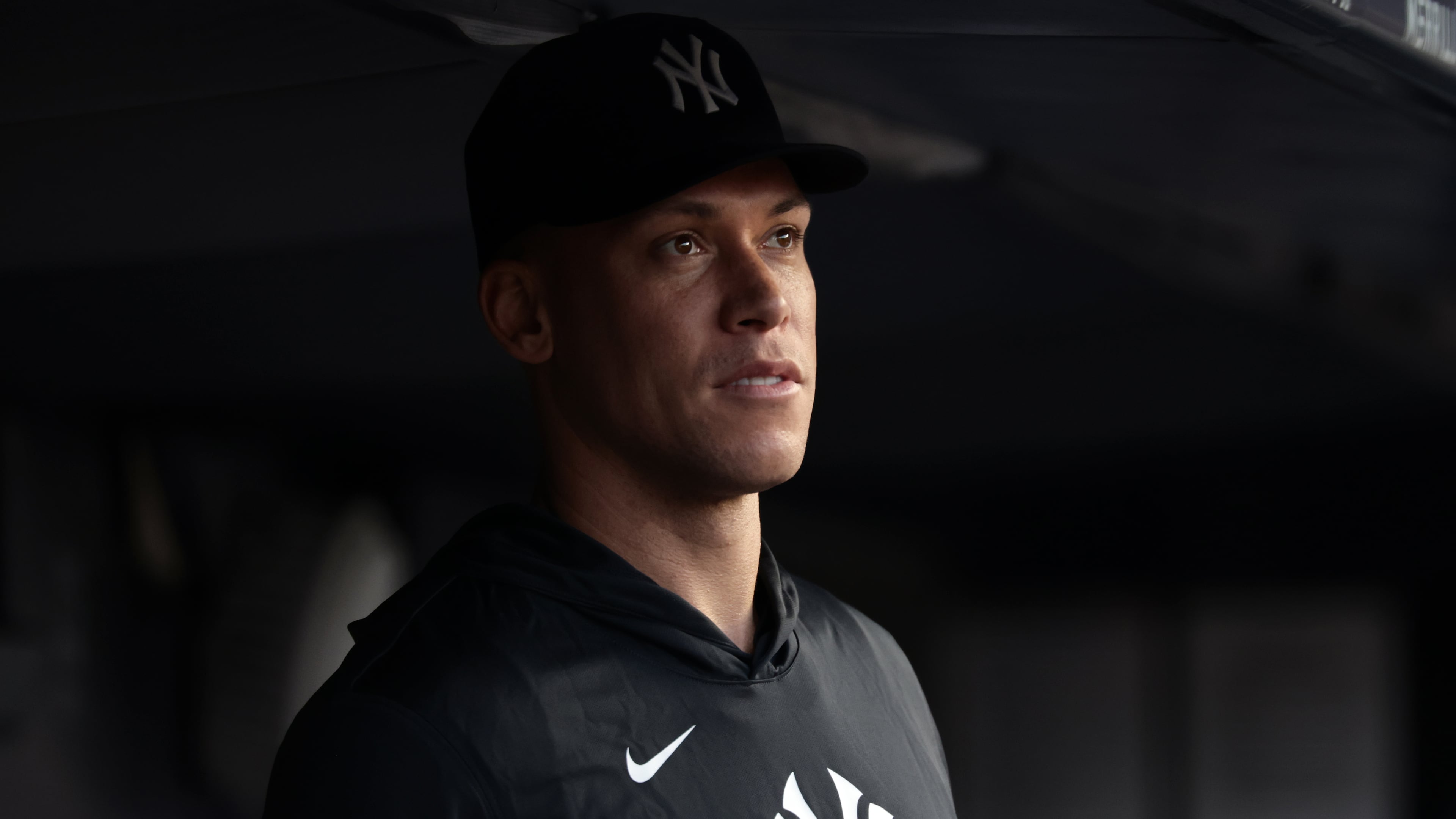 New York Yankees' Aaron Judge looks on from the dugout during the third inning of a baseball game against the Los Angeles Dodgers, Friday, July 17, 2026, in New York. (AP Photo/Adam Hunger)