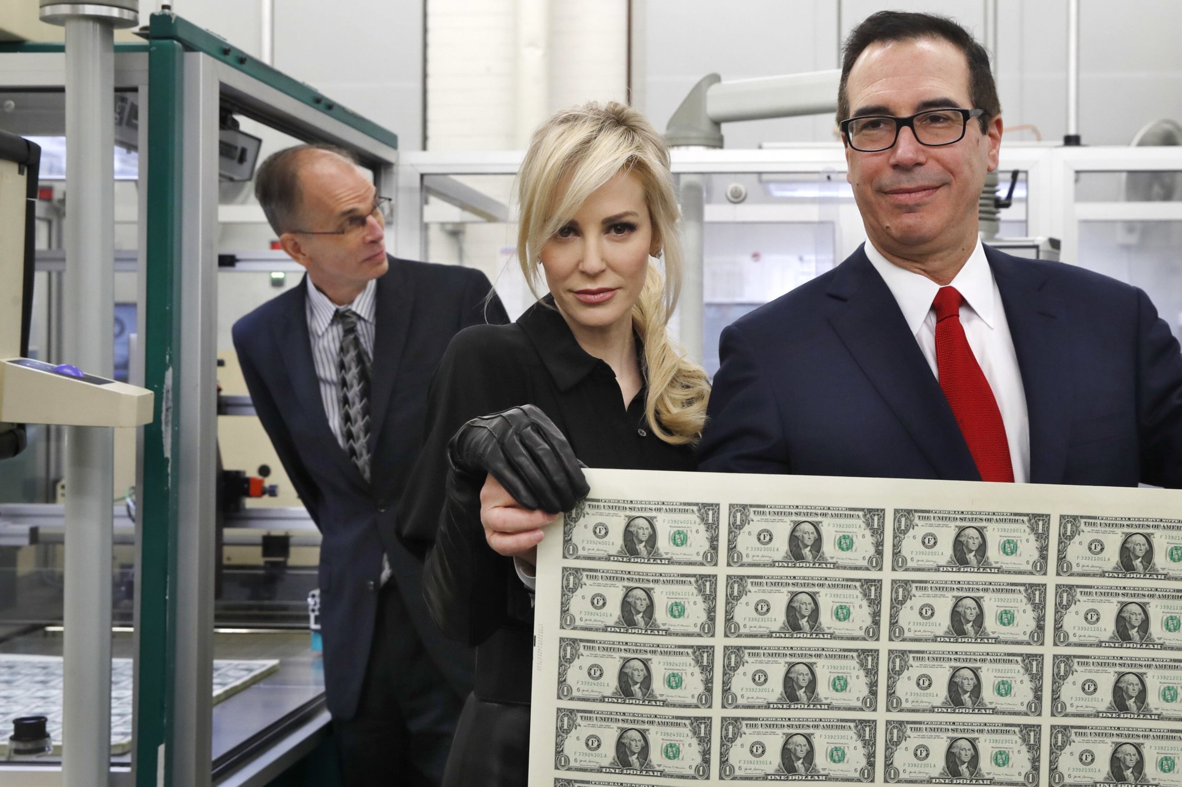 Personal signatures are slowly losing relevance. U.S. Treasury Secretary Steven Mnuchin, right, (shown with his wife Louise Linton) used block letters rather than a traditional signature on new dollar bills.
