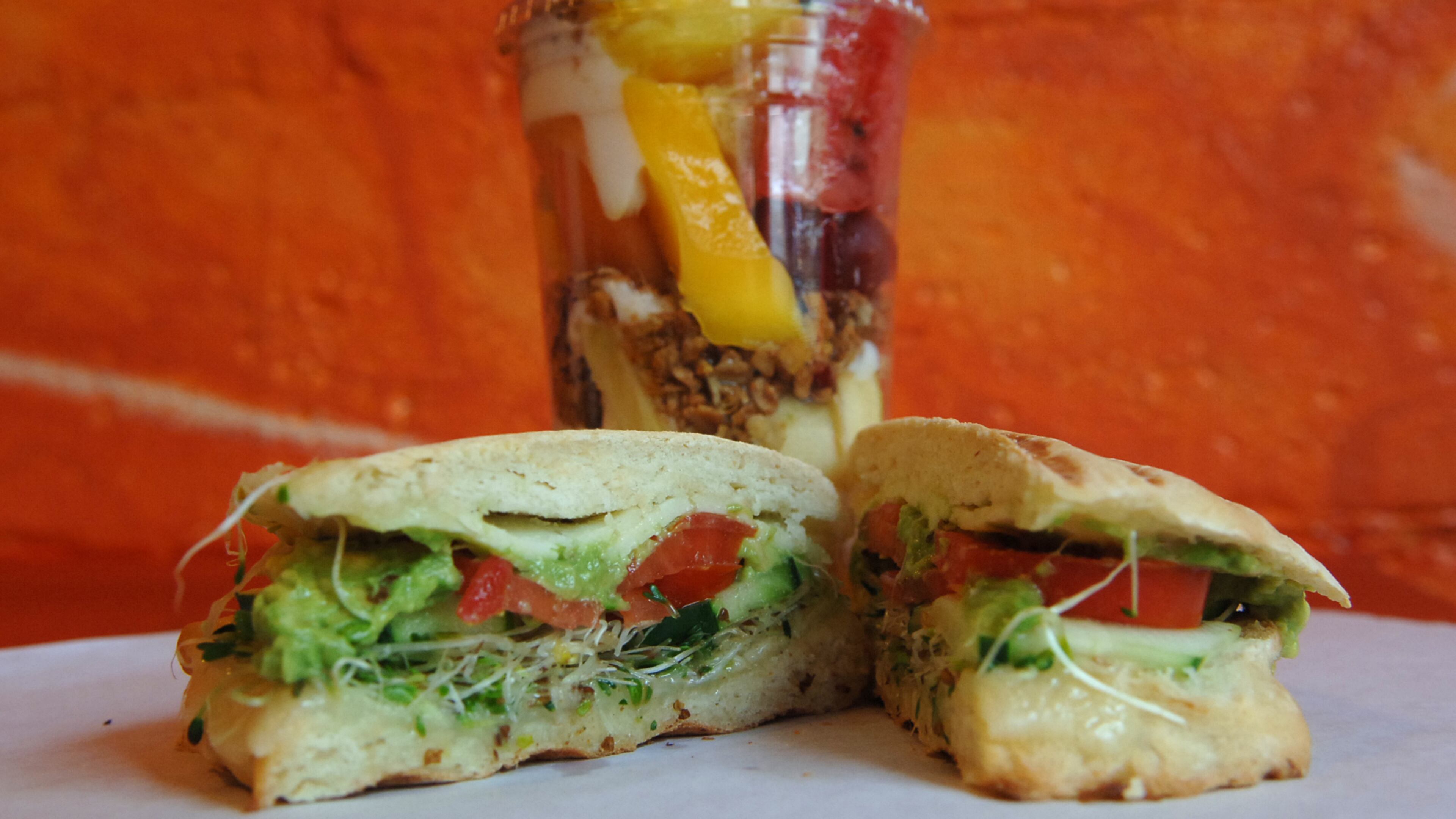 Just Veggin' sandwich and a Dolce Vitta fruit cup from LottaFrutta. (Becky Stein/SPECIAL)