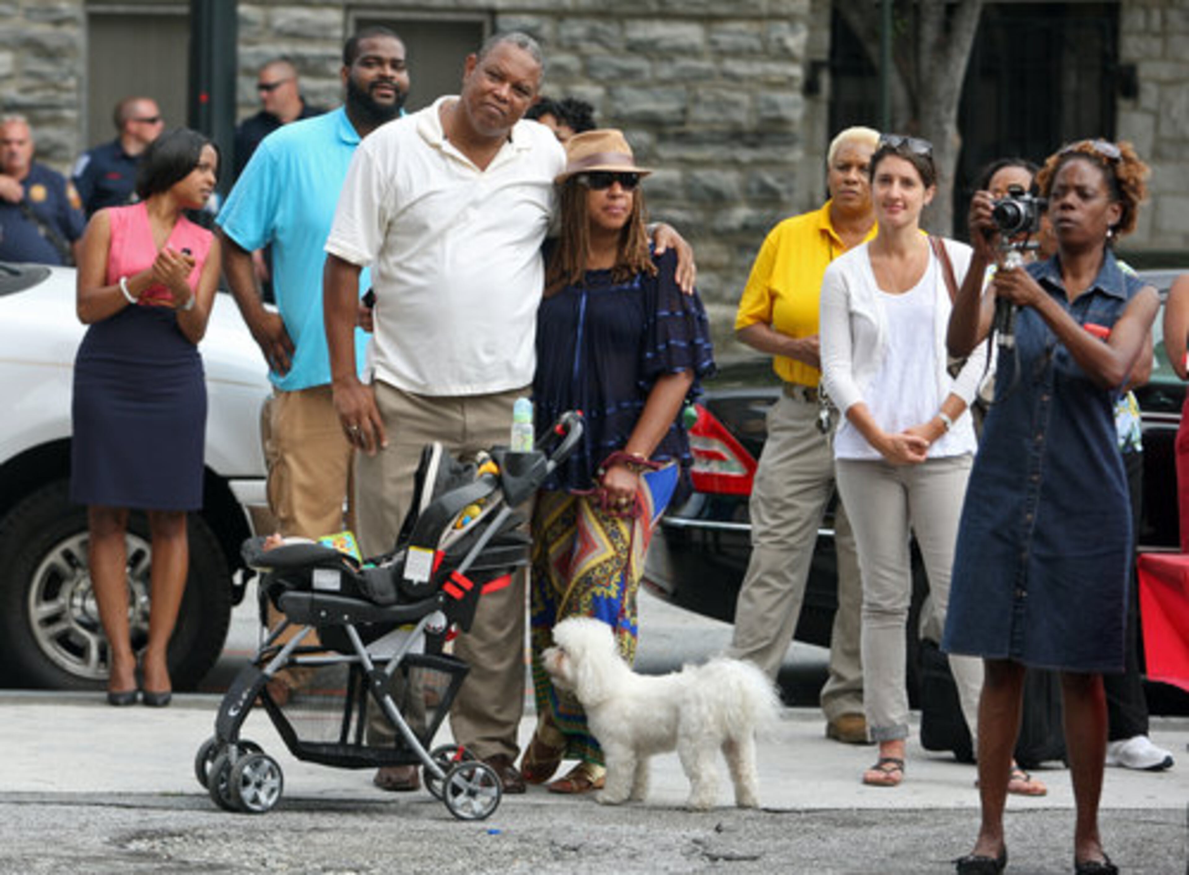 Spectators gather and listen to the speech by John Lewis.