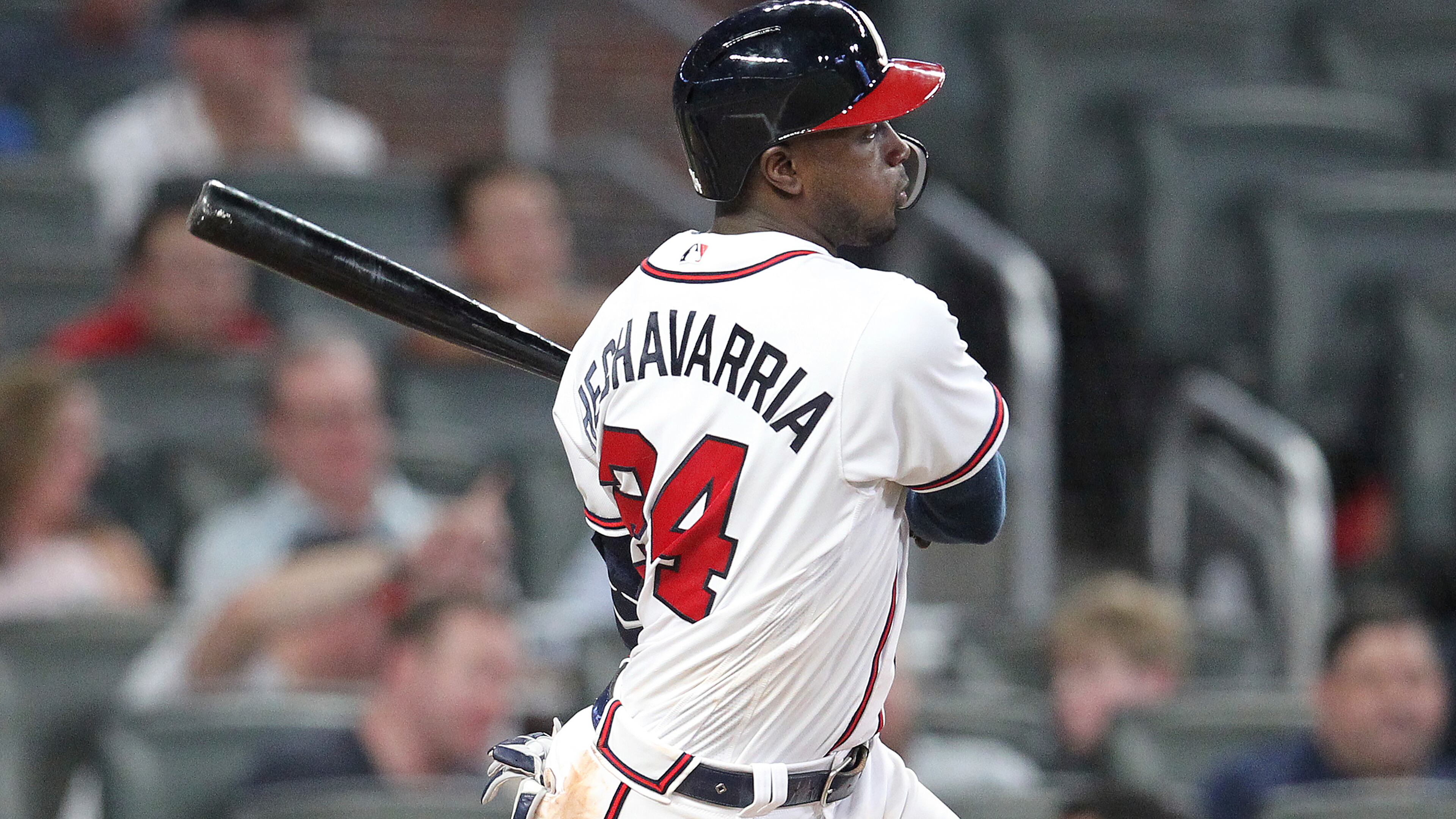 Atlanta Braves' Adeiny Hechavarria hits a double against the Miami Marlins during the ninth inning of a baseball game Thursday, Aug. 22, 2019, in Atlanta. (AP Photo/Tami Chappell)