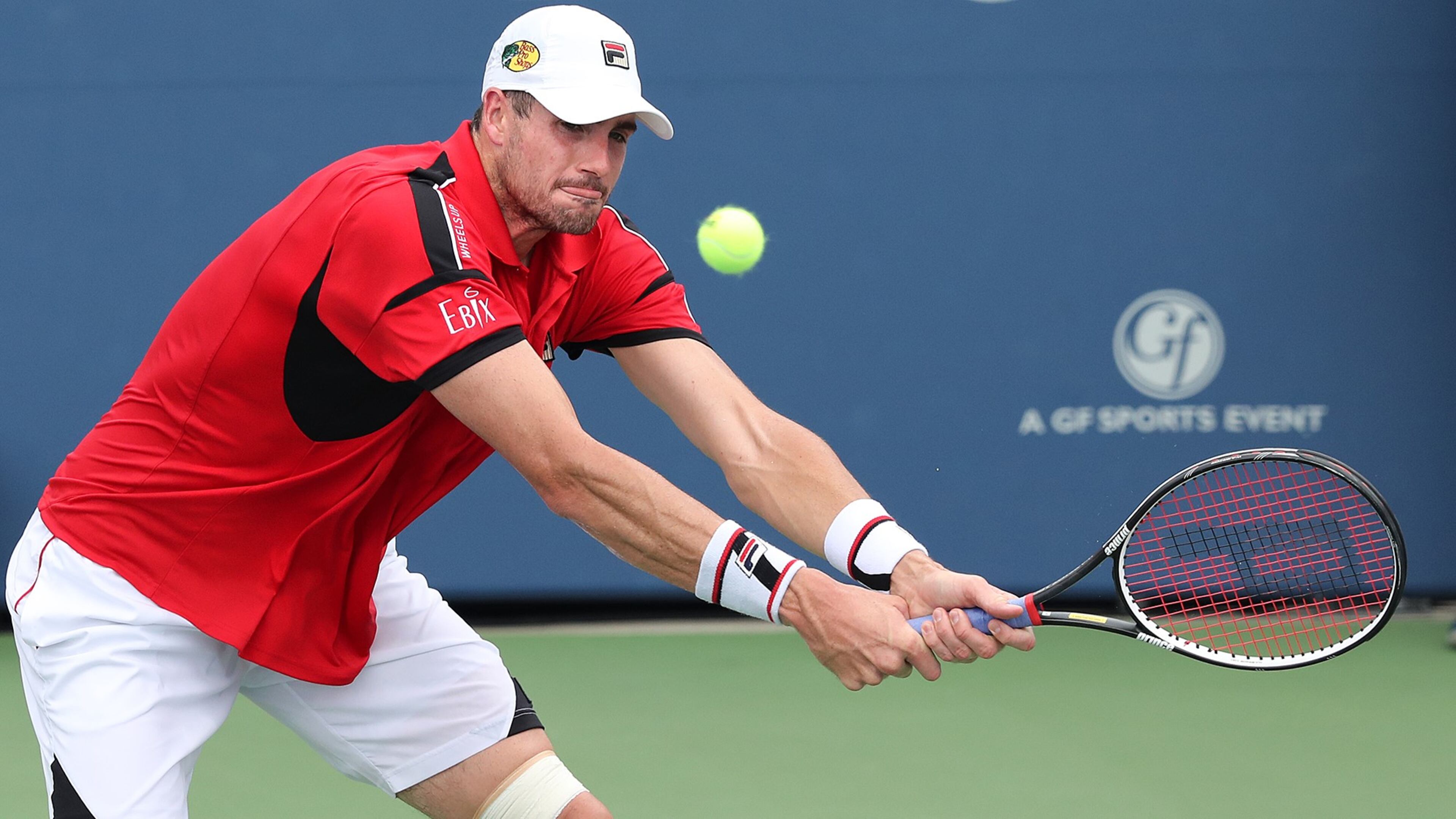 John Isner eturns a volley to Nick Kyrgios in the singles finals of the BB&T Atlanta Open on Aug. 7, 2016, in Atlanta. Curtis Compton /ccompton@ajc.com