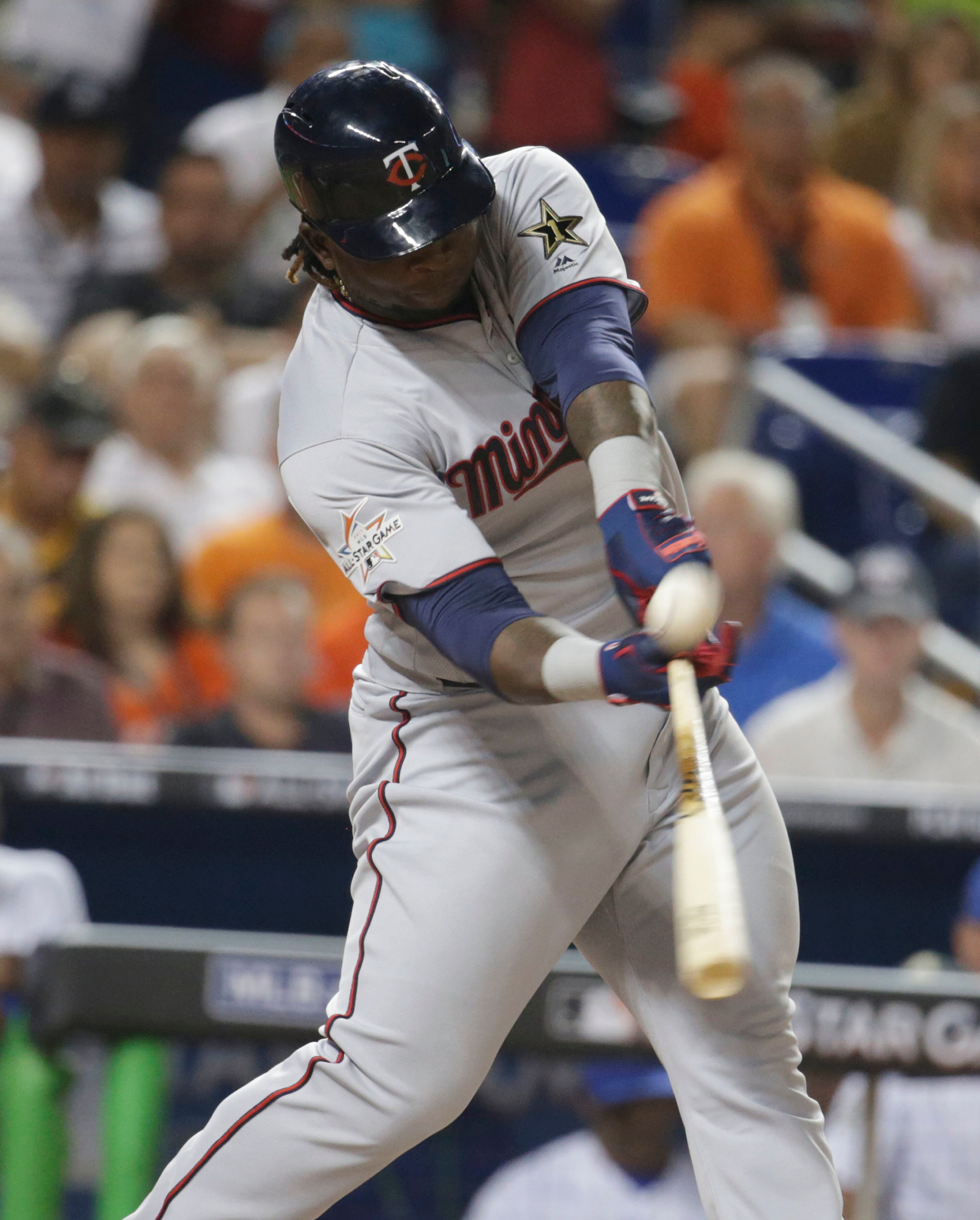 American League's Minnesota Twins Miguel Sanó hits an RBI which scores a run in the fifth inning, during the MLB baseball All-Star Game, Tuesday, July 11, 2017, in Miami. (AP Photo/Lynne Sladky)