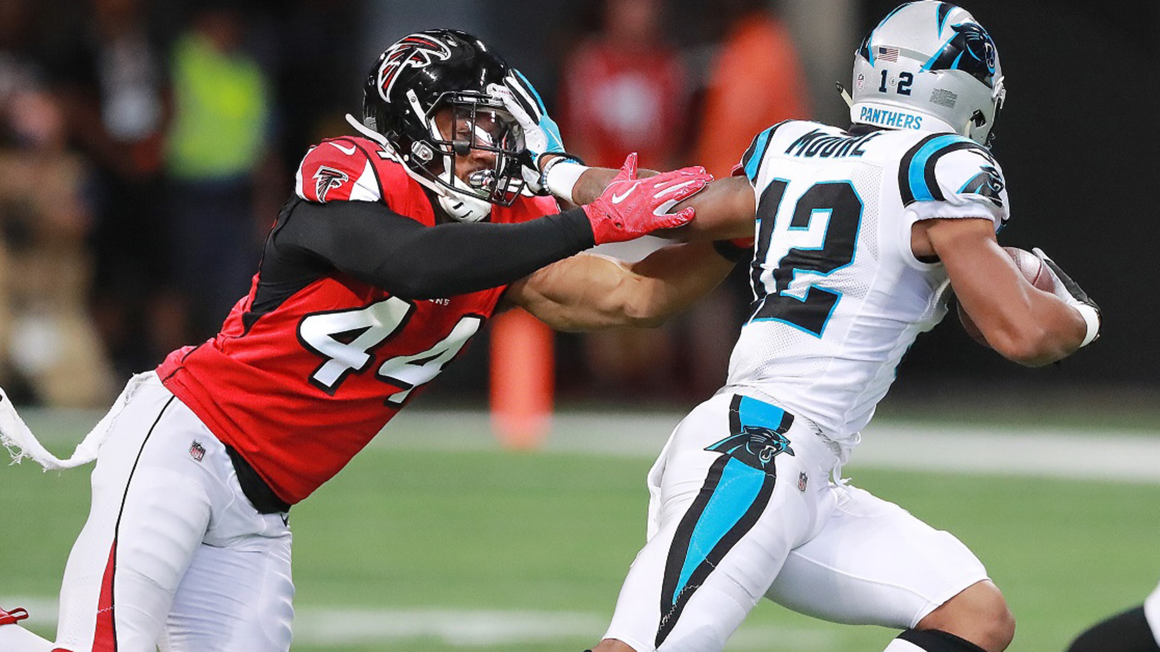Falcons linebacker Vic Beasley Jr. tries to run down Panthers wide receiver DJ Moore on Sunday, Sept 16, 2018, in Atlanta. Curtis Compton/ccompton@ajc.com