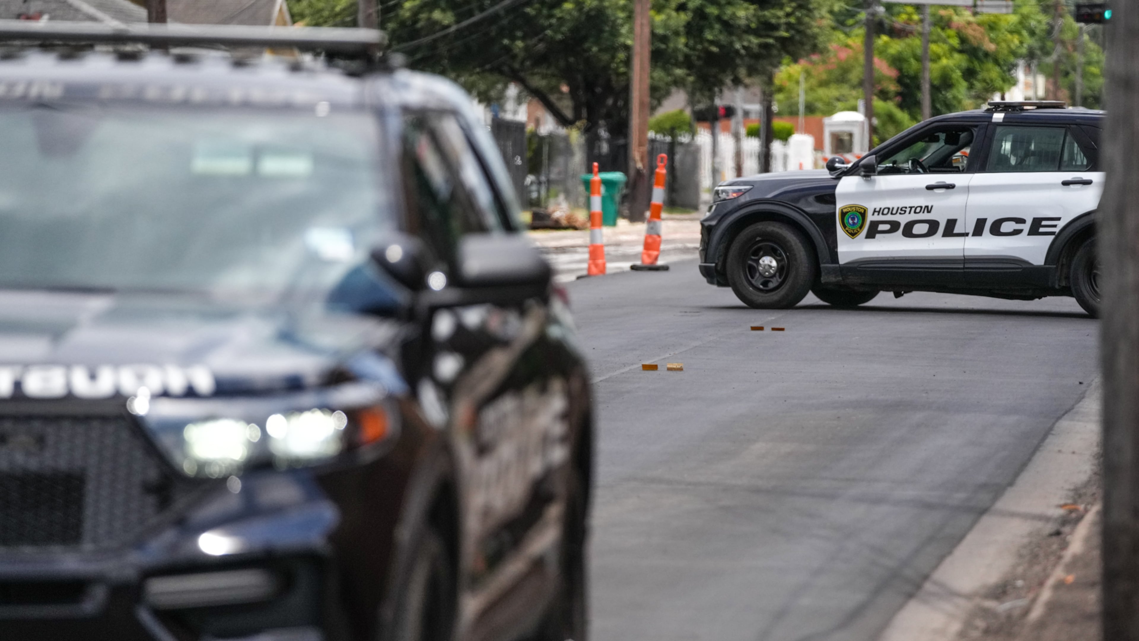 Police work on Canal Street in Houston, Tuesday, July 7, 2026, after a shooting. (Jacob Lujan/Houston Chronicle via AP)