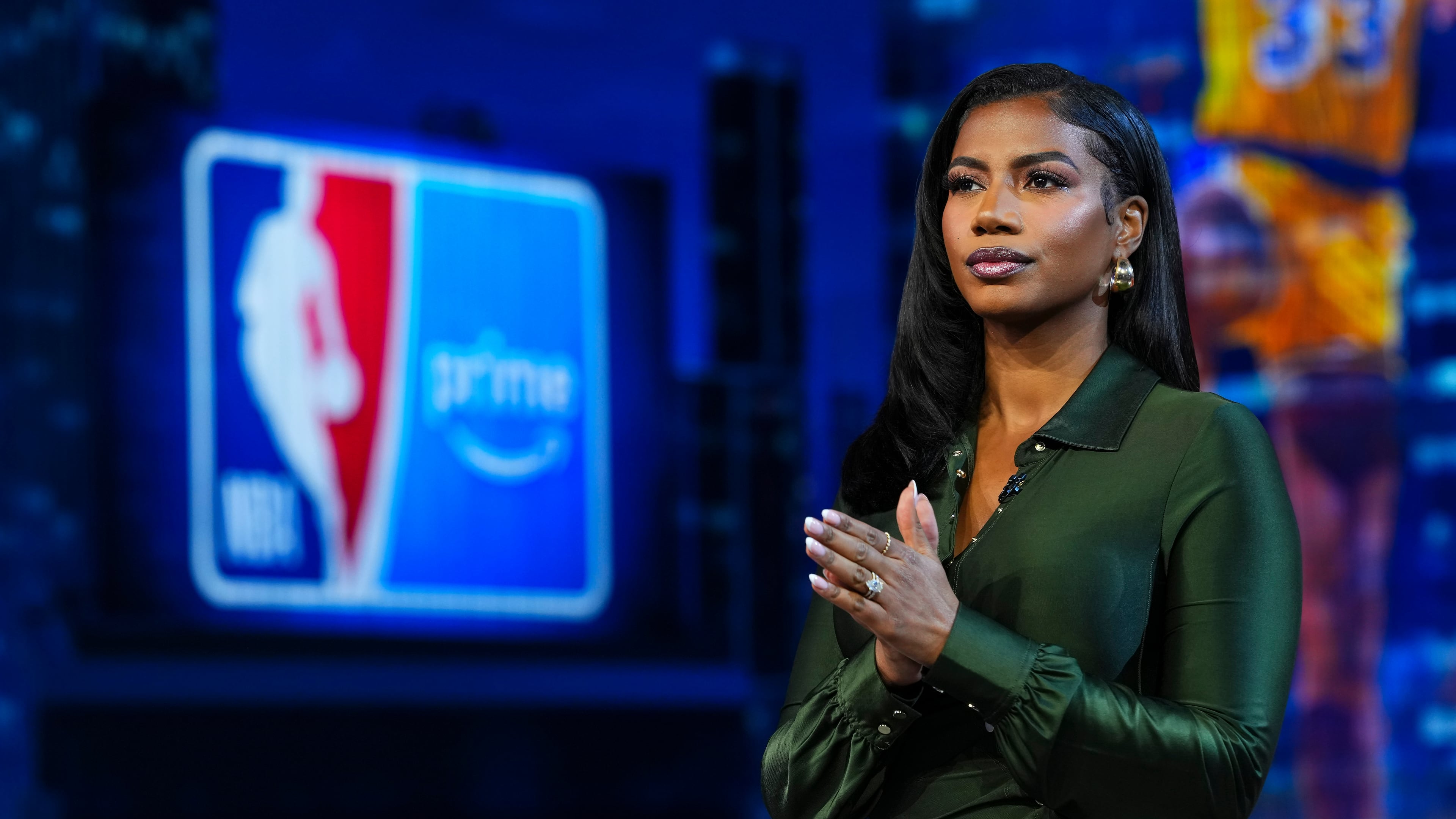 Taylor Rooks looks on from the set of the “NBA on Prime” halftime show at Amazon Studios on Friday, Oct. 24, 2025, in Culver City, Calif. The Georgia native is building on personal experiences to support families facing financial hardship. (Cooper Neill via AP 2025)