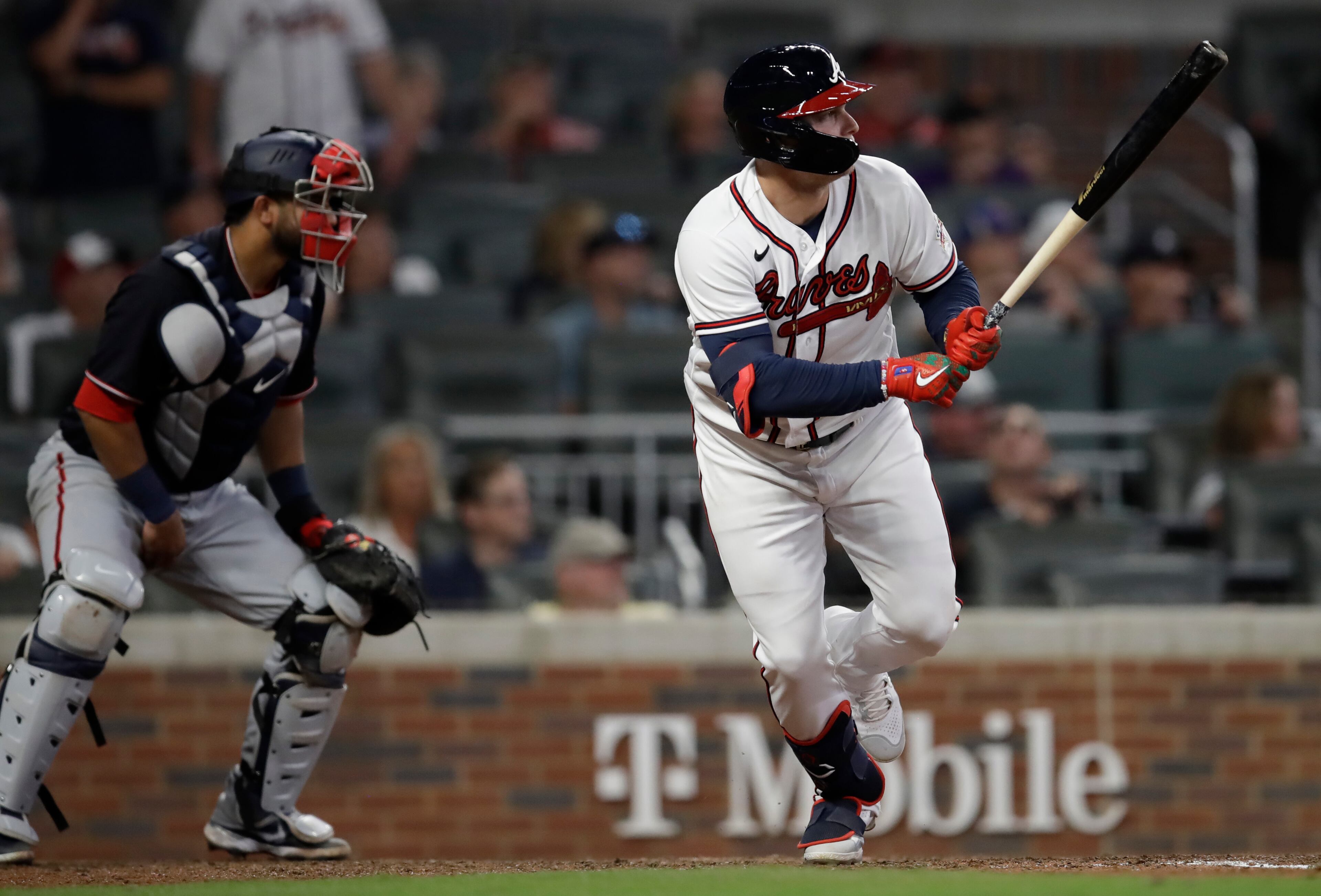 Atlanta Braves' Joc Pederson watches his hit that drove in the winning run against the Washington Nationals during the 10th inning of a baseball game Thursday, Sept. 9, 2021, in Atlanta. (AP Photo/Ben Margot)