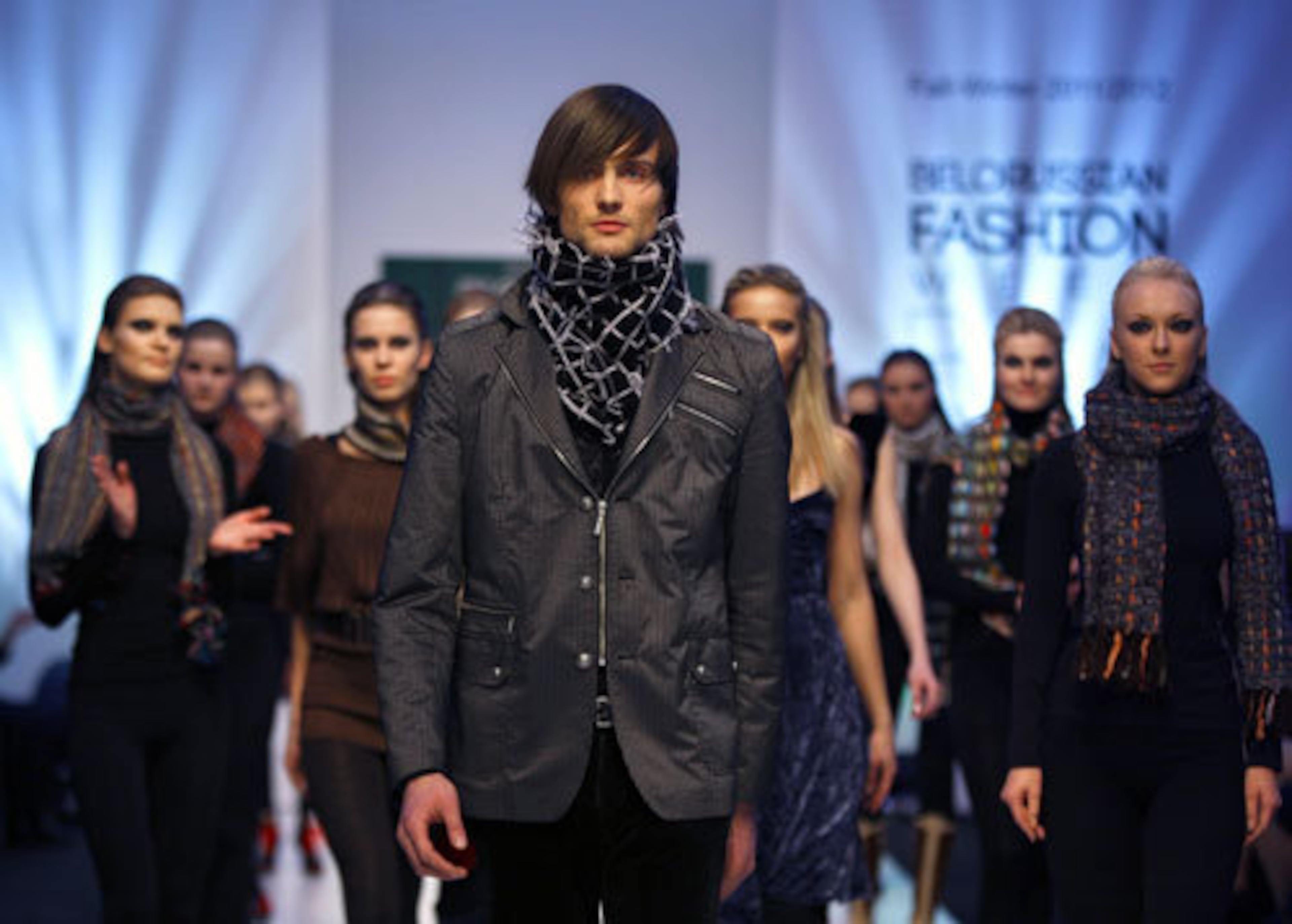 Models present a creation by Belarus designer Dmitry Prigozhayev during Belarus Fashion Week in Minsk, Belarus, Thursday, April 14, 2011.