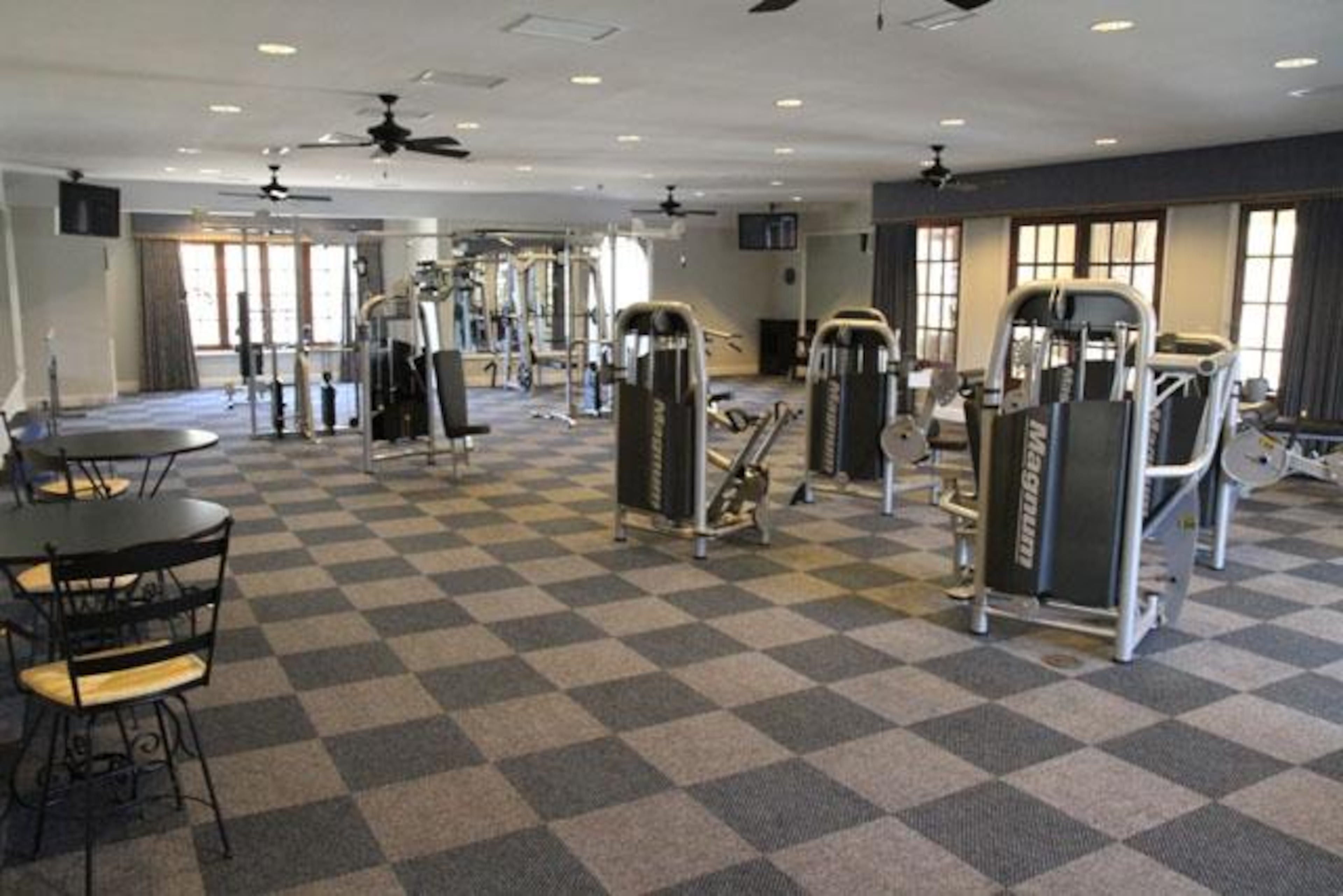 The estate features a private 18-hole golf course, sports courts, stables, a camping area, an exercise facility, a massage room and a pool. The entire property is gated and security cameras span the property.