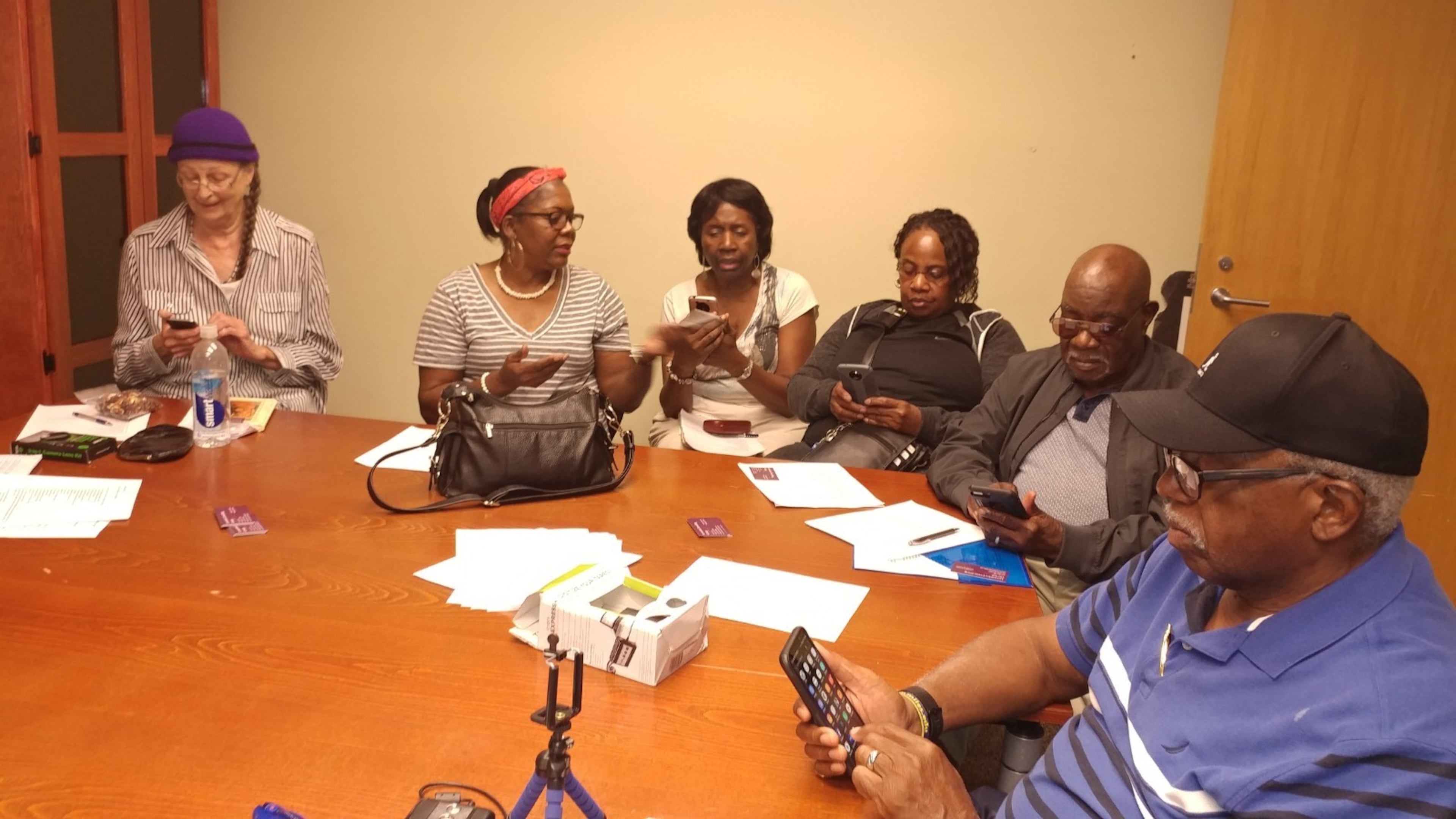 Participants practice using their smartphones in a Facts to Thrive technology class. The nonprofit assists metro Atlanta seniors in learning skills that enhance their daily lives. (Courtesy of Facts to Thrive)