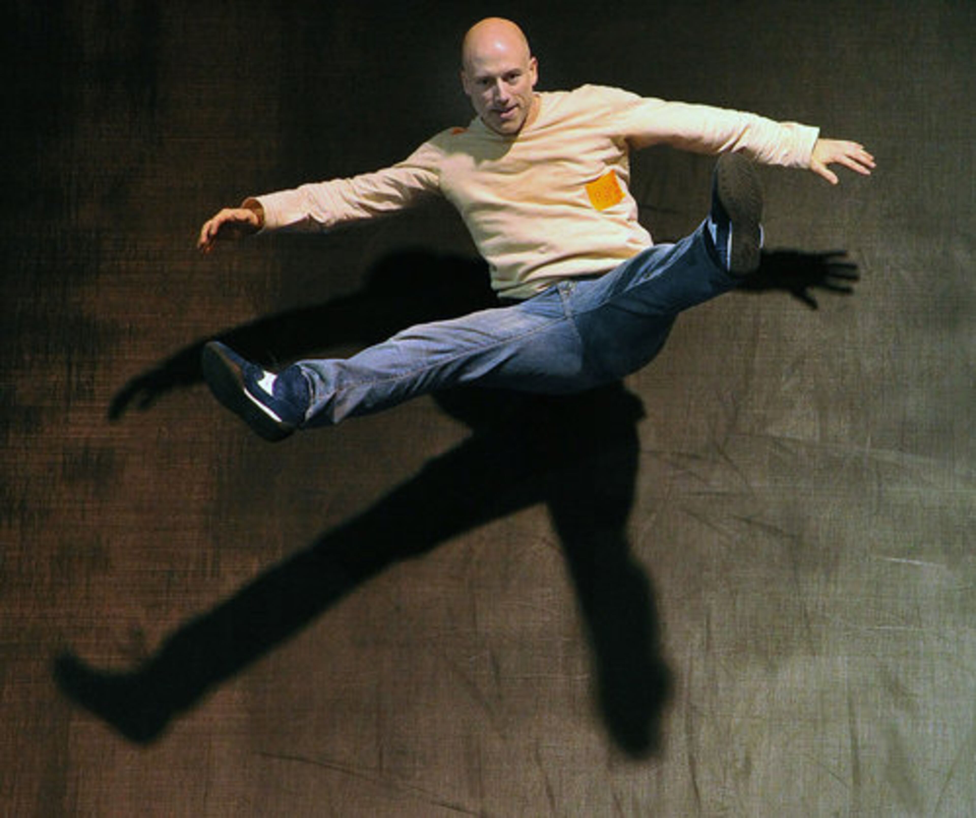 Britt Weber attempts a toe touch.