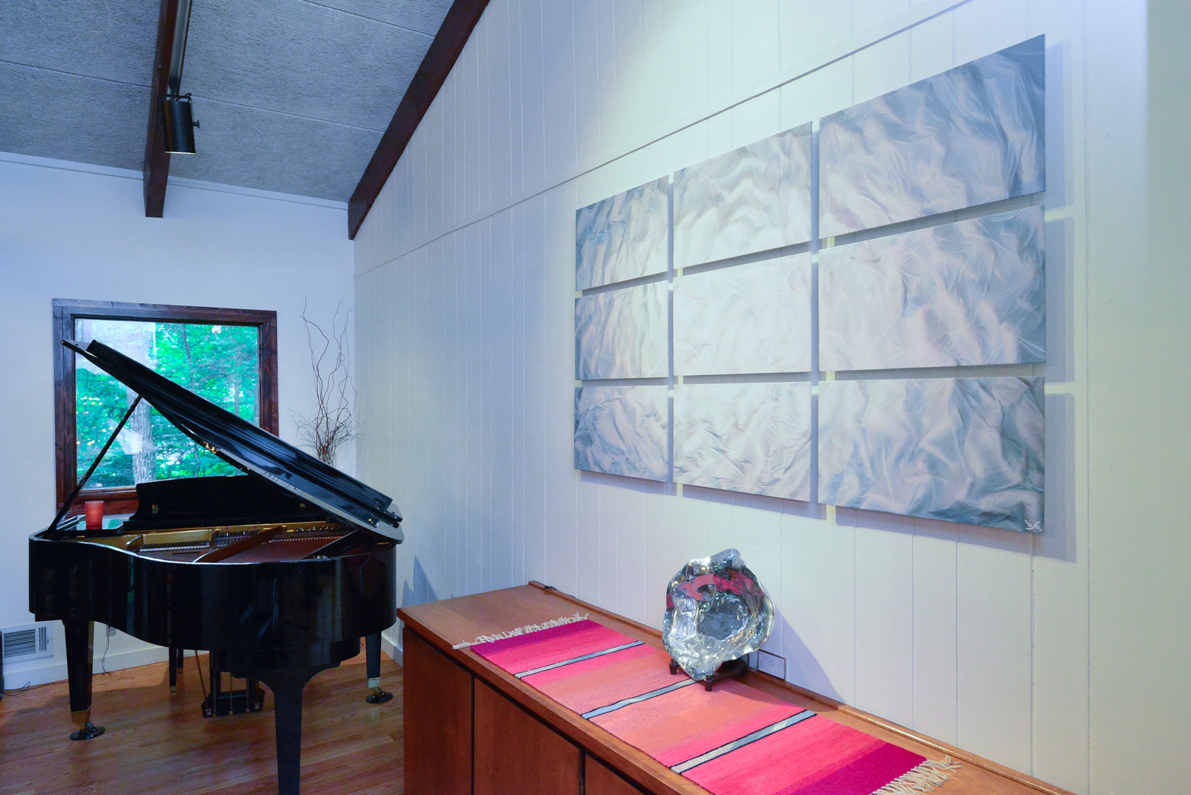 The piano is one of the pieces that the homeowners, who married in 2009, brought from their previous residences. Most of their furniture was traditional and they bought new contemporary items to furnish their renovated home.