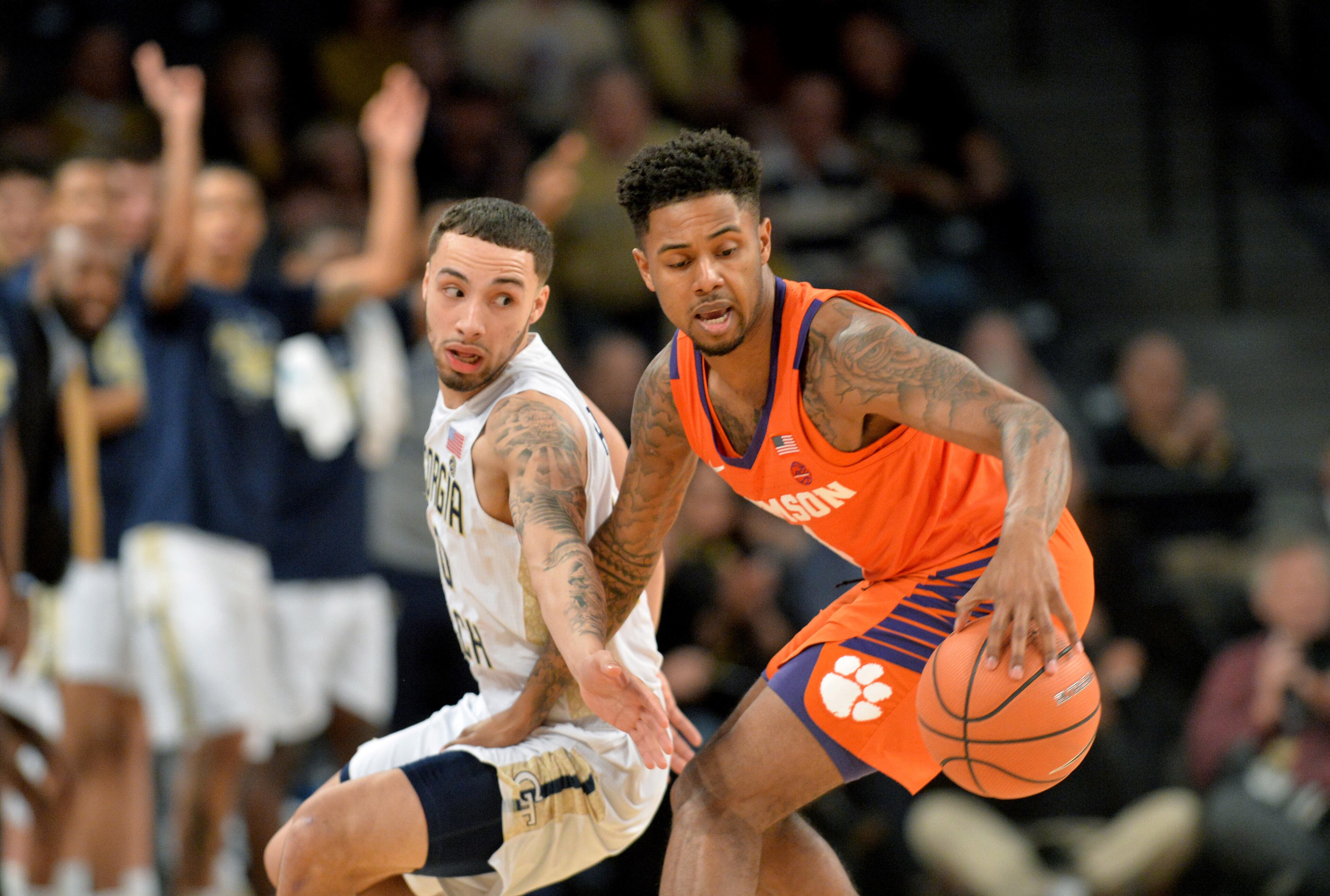 January 28, 2018 Atlanta - Georgia Tech guard Jose Alvarado (10) tries to steal a ball from Clemson guard Shelton Mitchell (4) during the first half in a NCAA college basketball game at McCamish Pavilion in Atlanta on Sunday, January 28, 2018. HYOSUB SHIN / HSHIN@AJC.COM
