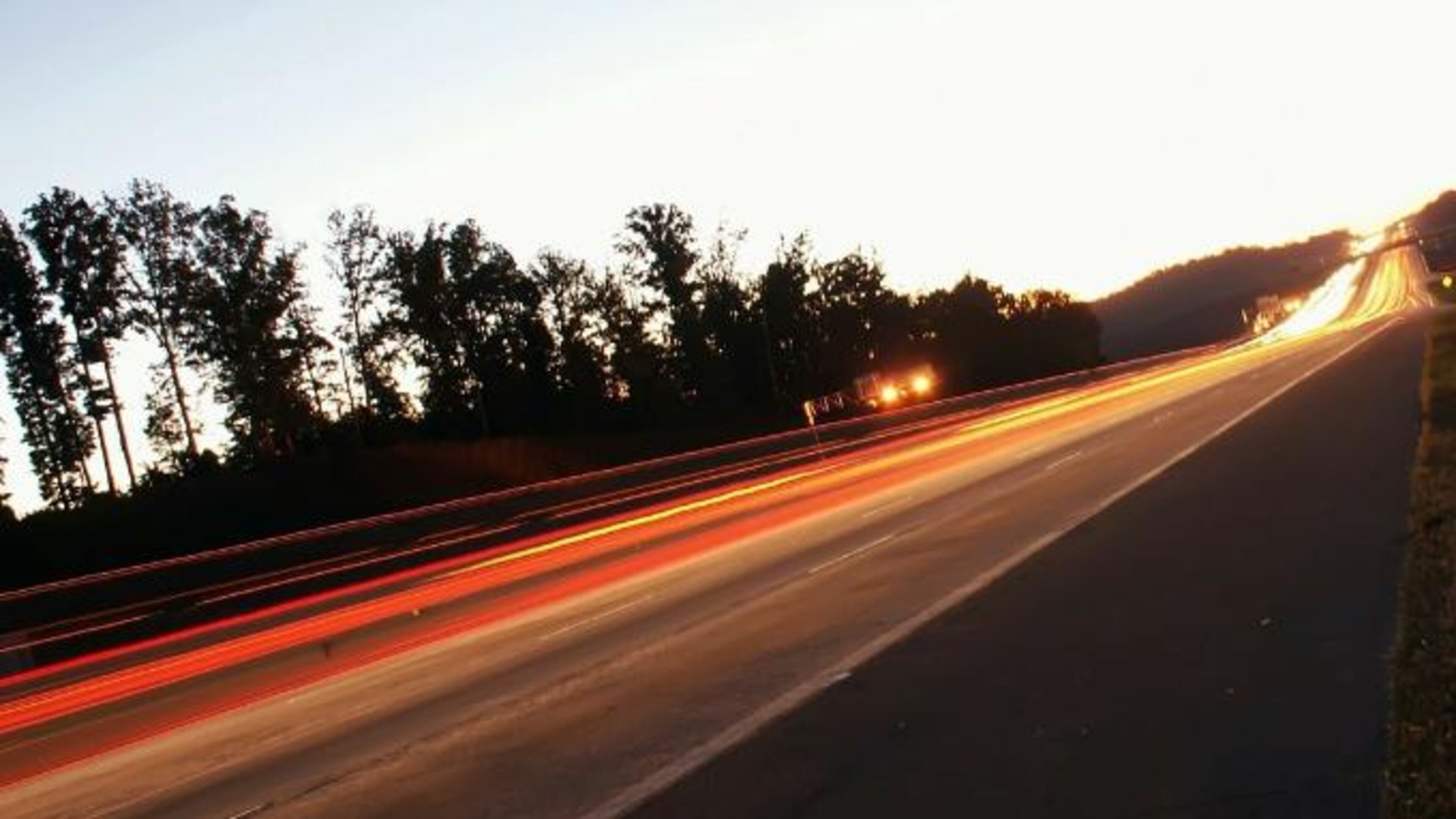 Stock photo of vehicles traveling on a freeway.