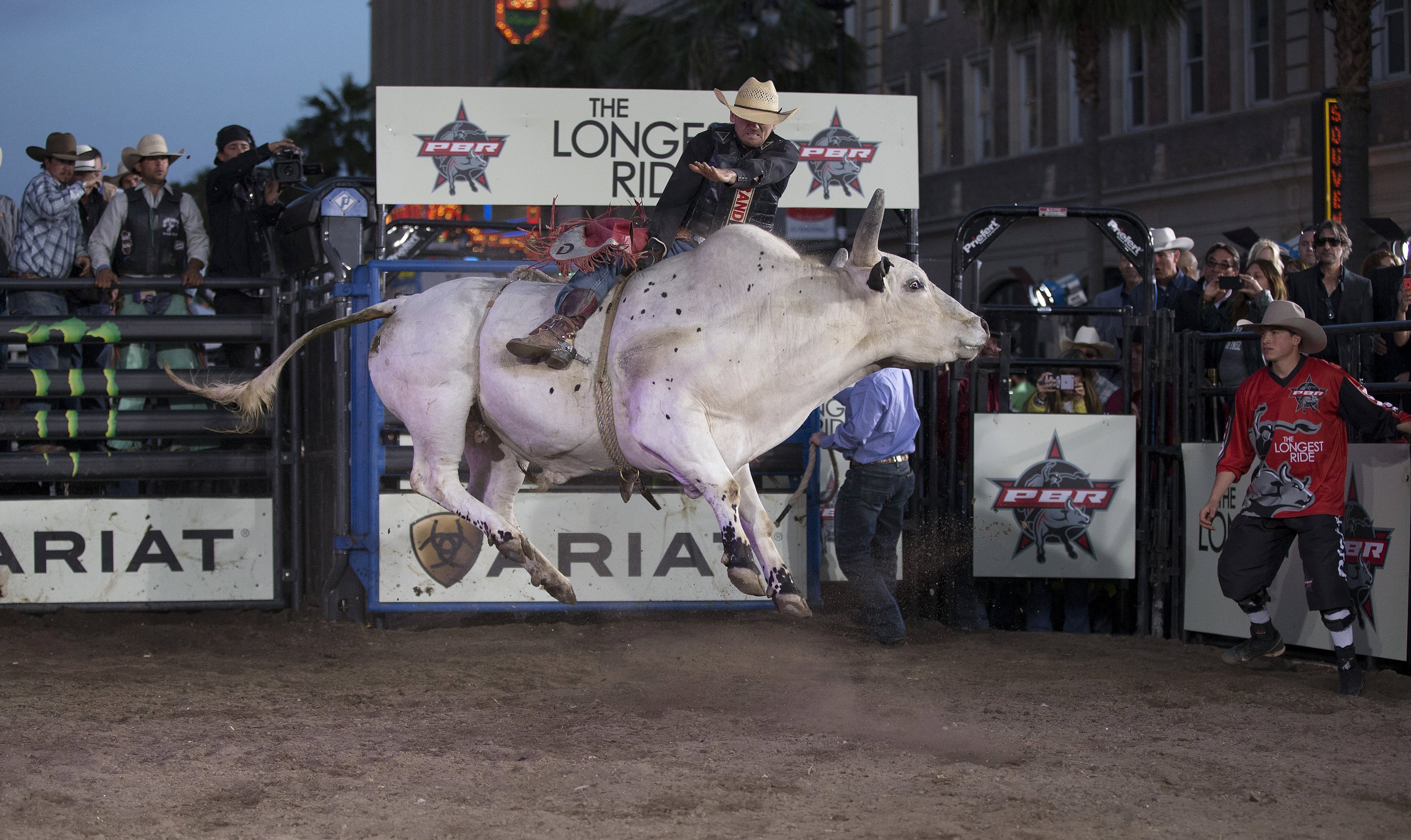 A professional bull rider competes at the premiere of "The Longest Ride" at the TCL Chinese theatre in Hollywood, California April 6, 2015. The movie opens in the U.S. on April 10. REUTERS/Mario Anzuoni