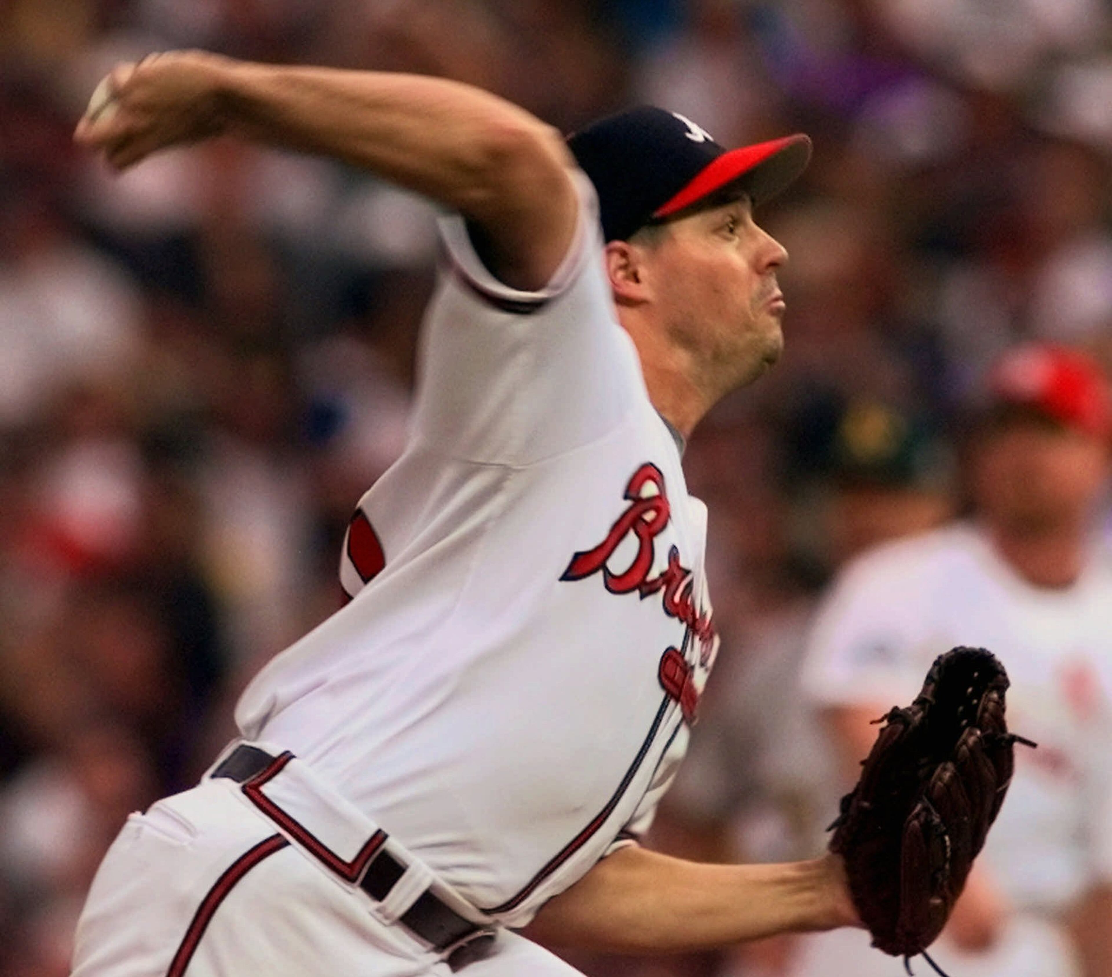 Braves pitcher Greg Maddux throws in the first inning of the 69th annual All-Star game Tuesday, July 7, 1998 at Denver's Coors Field.