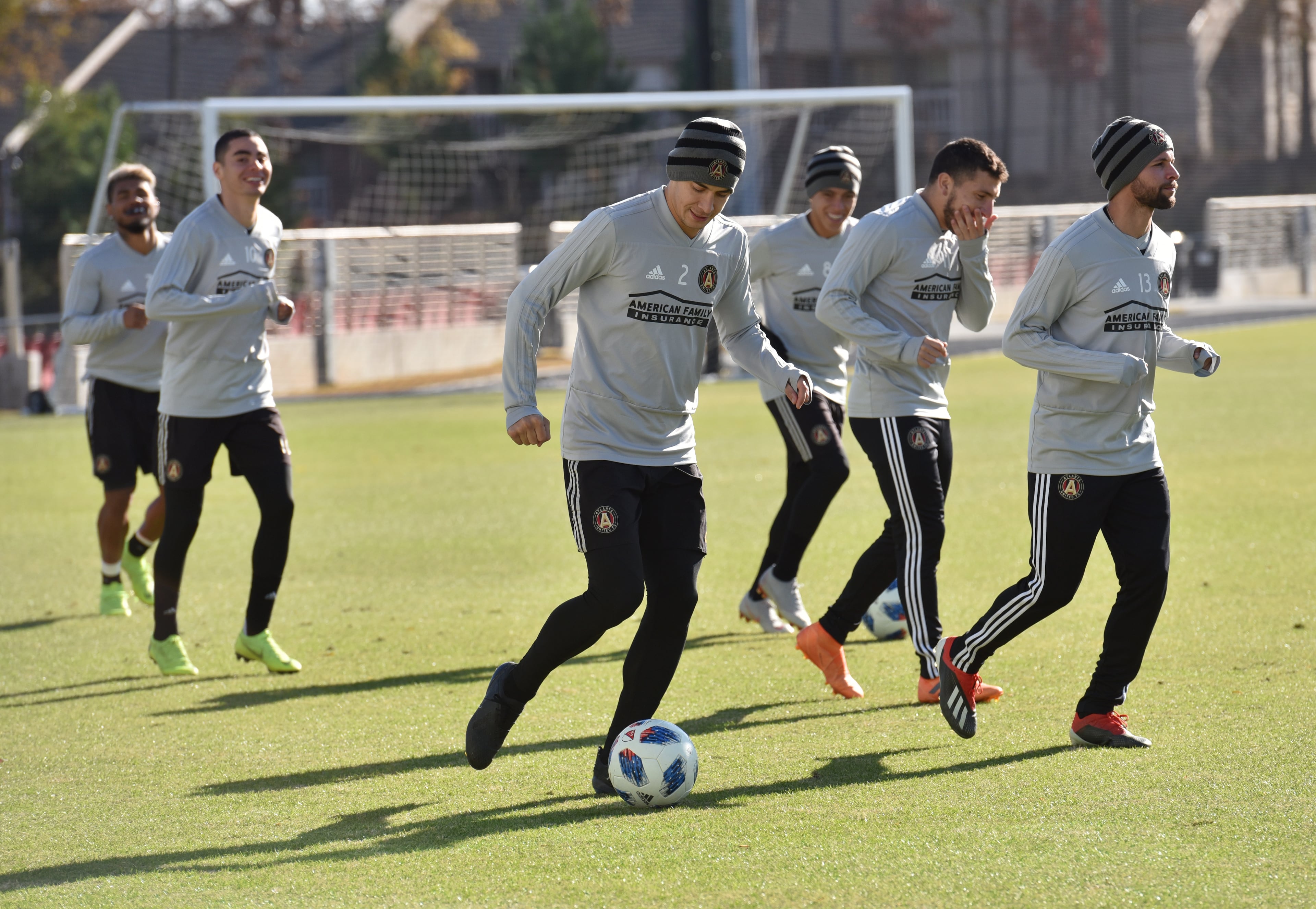 Defender Franco Escobar works with the ball as players warm up during Tuesday's practice at Children's Healthcare of Atlanta Training Ground in Marietta. (Hyosub Shin/hshin@ajc.com)