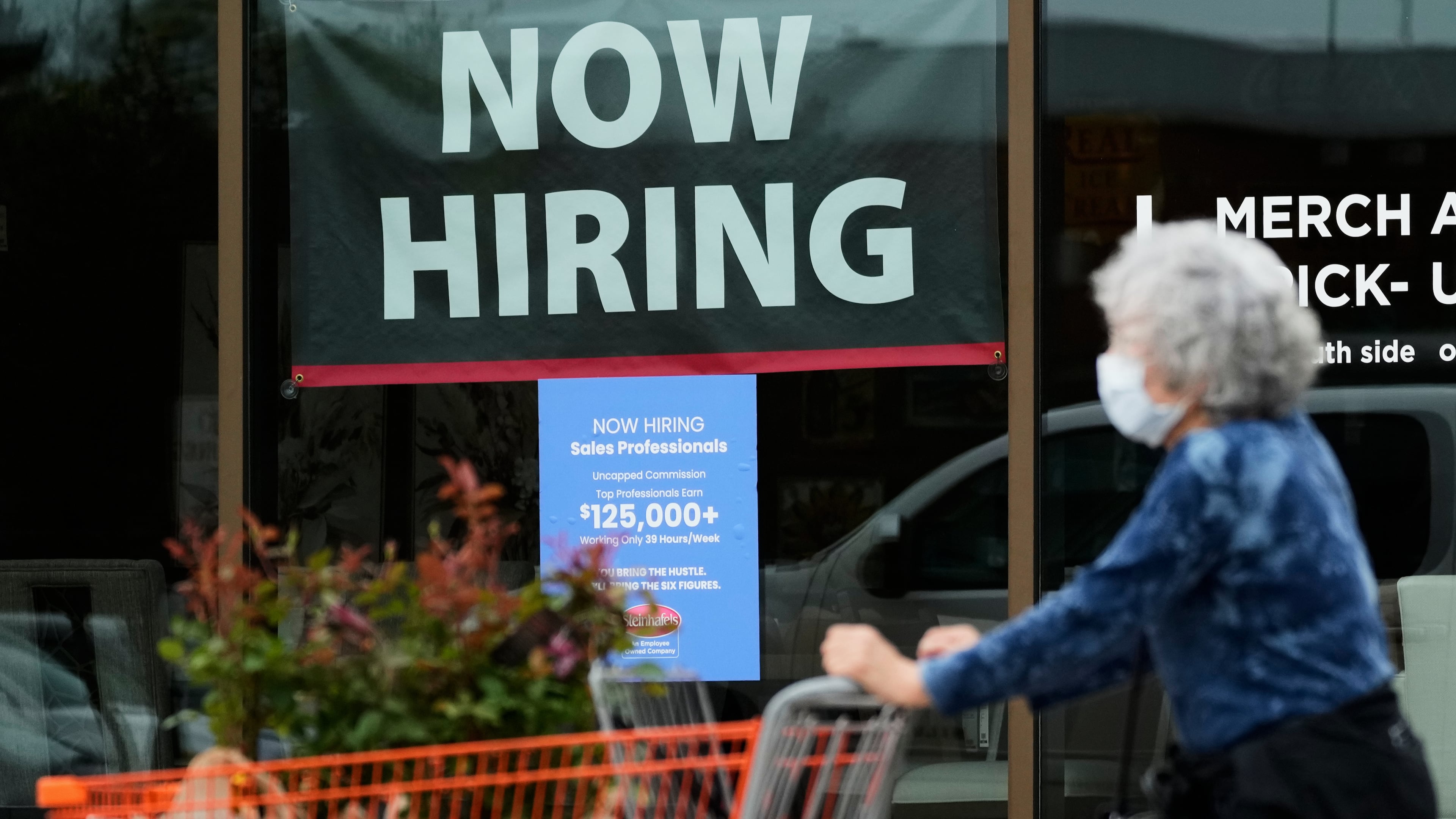 FILE - Hiring sign for sales professionals is displayed at a store, in Vernon Hills, Ill., Wednesday, April 15, 2026. (AP Photo/Nam Y. Huh, file)