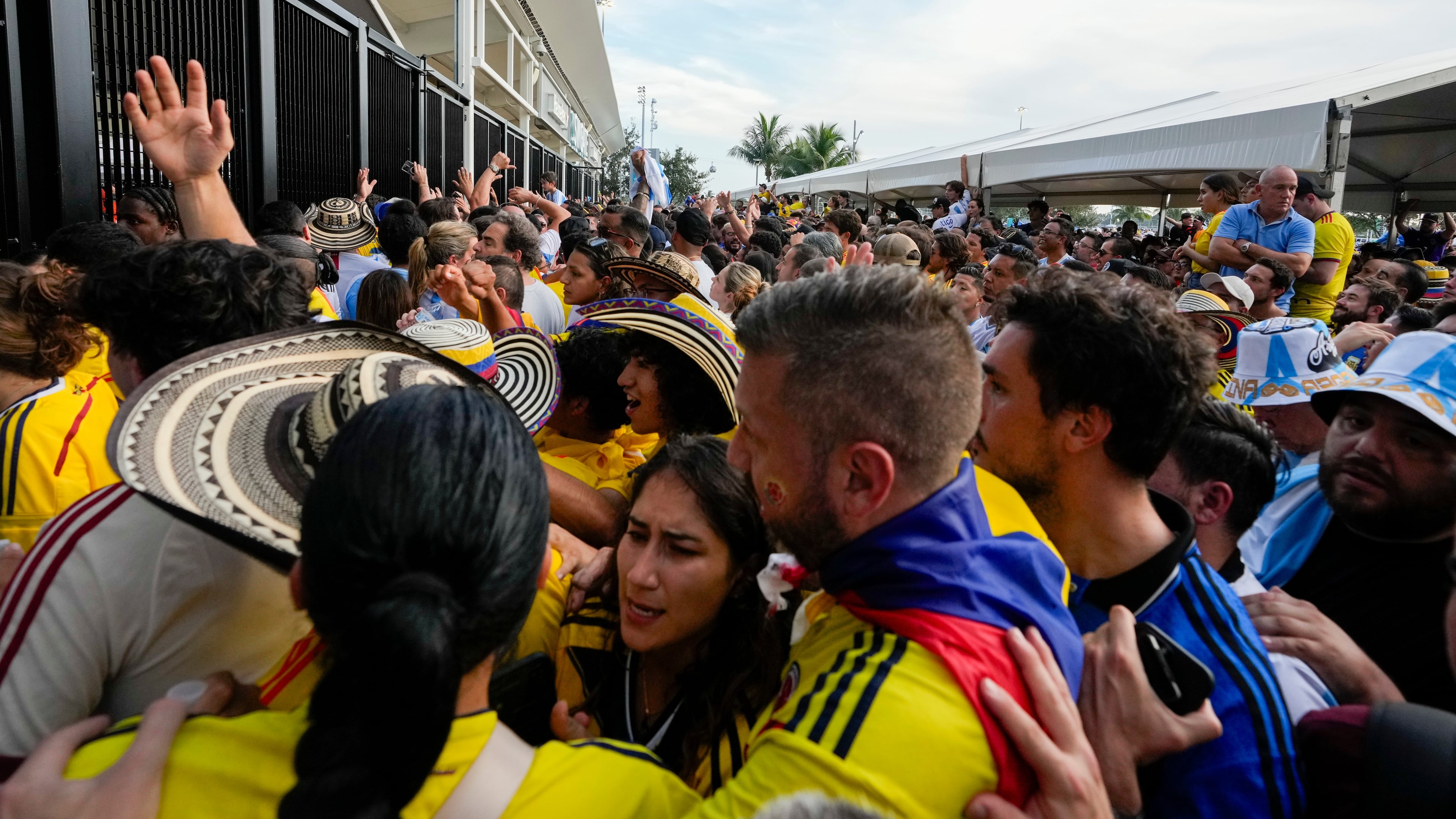 FILE - Fans wait to enter the stadium prior to the Copa America final soccer match between Argentina and Colombia in Miami Gardens, Fla., July 14, 2024. (AP Photo/Lynne Sladky, File)