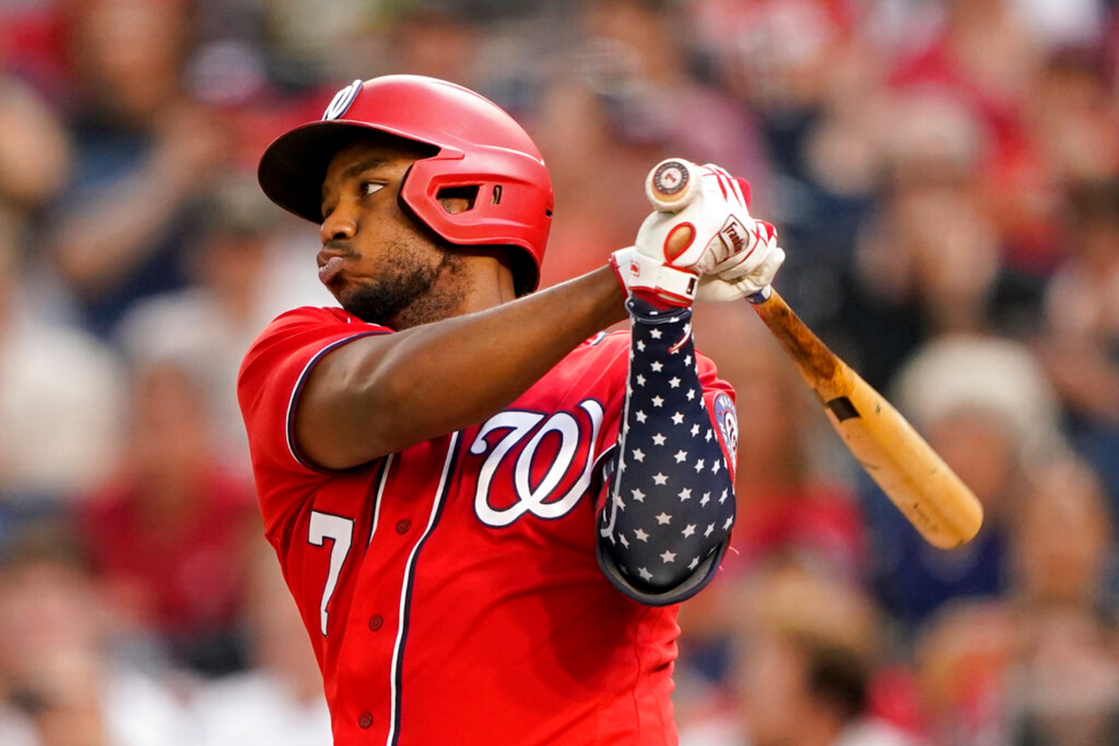 Washington Nationals' Maikel Franco grounds out in the second inning of a baseball game against the Atlanta Braves, Thursday, July 14, 2022, in Washington. Yadiel Hernandez scored on the play. (AP Photo/Patrick Semansky)
