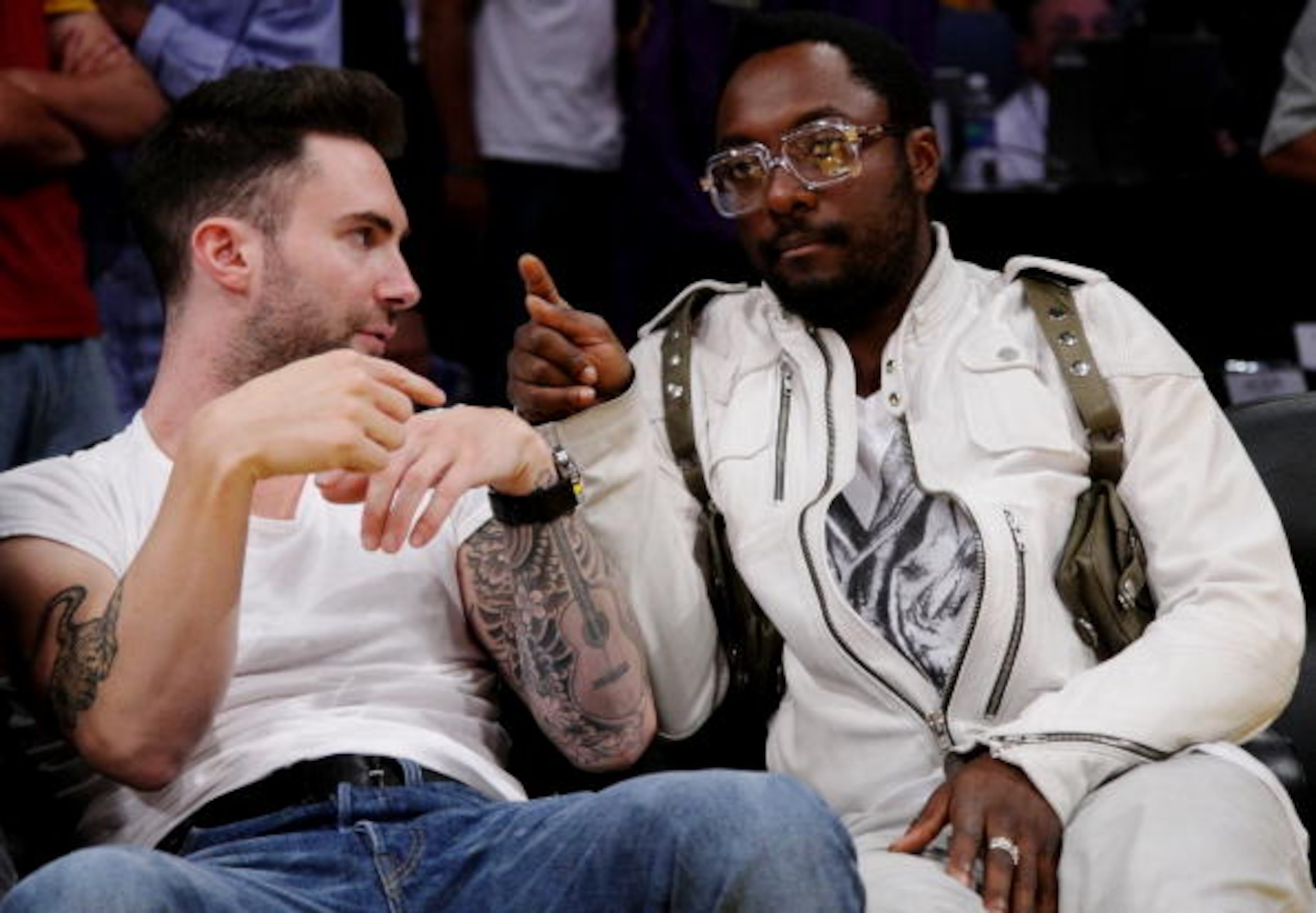 LOS ANGELES, CA - JUNE 7: Singer Adam Levine of the band Maroon 5 (L) and musician will.i.am of the group Black Eyed Peas attend Game Two of the NBA Finals between the Los Angeles Lakers and the Orlando Magic at Staples Center on June 7, 2009 in Los Angeles, California. (Photo by Noel Vasquez/Getty Images)