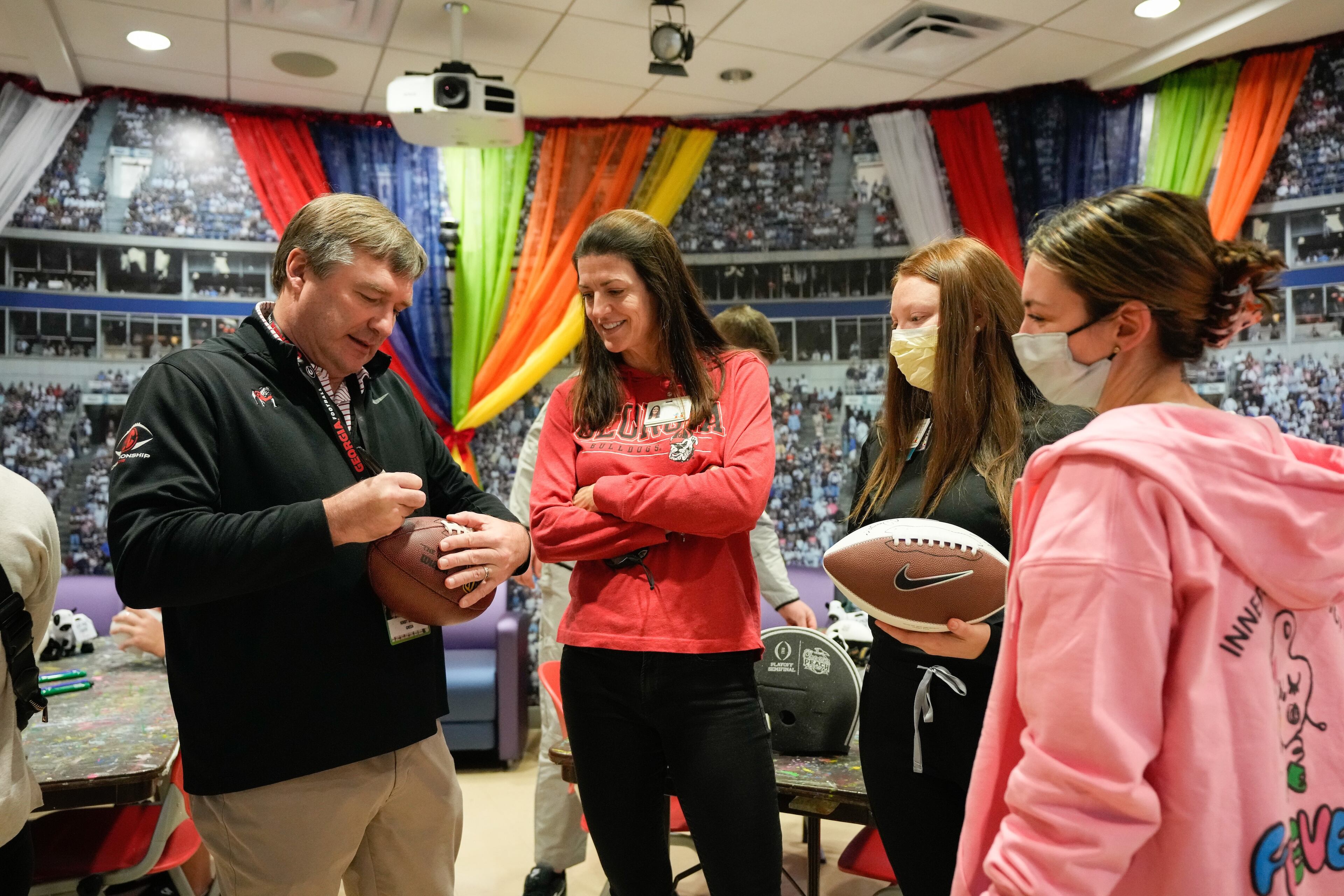 Georgia coaches and players visited Children’s Healthcare of Atlanta at Scottish Rite on Dec. 27, 2022 before the 2022 Chick-fil-A Peach Bowl. (Photo by Paul Abell/Chick-fil-A Peach Bowl)