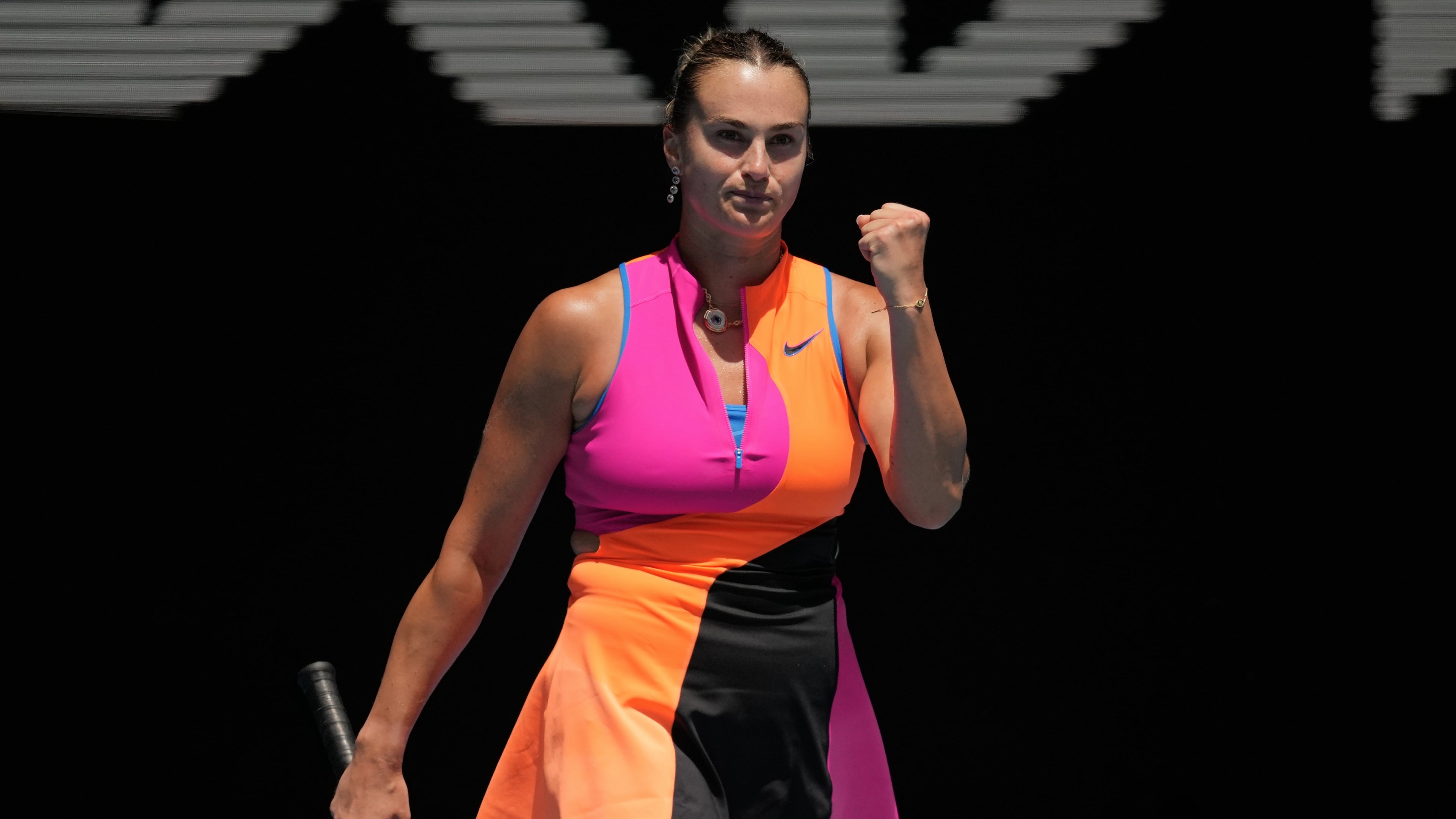 Aryna Sabalenka of Belarus reacts after defeating Victoria Mboko of Canada in their fourth round match at the Australian Open tennis championship in Melbourne, Australia, Sunday, Jan. 25, 2026. (AP Photo/Dita Alangkara)