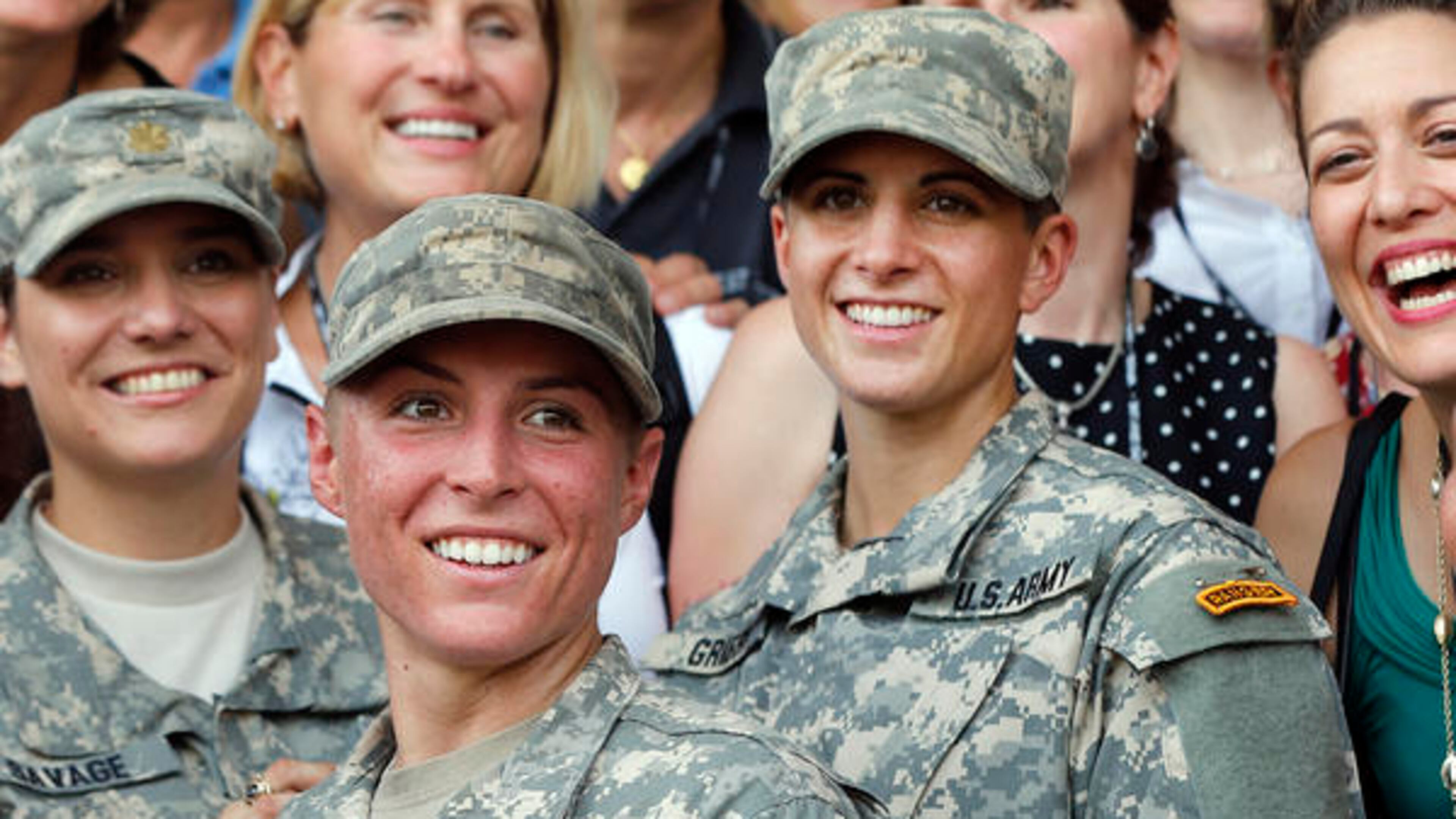 U.S. Army First Lt. Shaye Haver, center, and Capt. Kristen Griest, right, pose for photos with other female West Point alumni after an Army Ranger school graduation ceremony at Fort Benning. AP Photo/John Bazemore