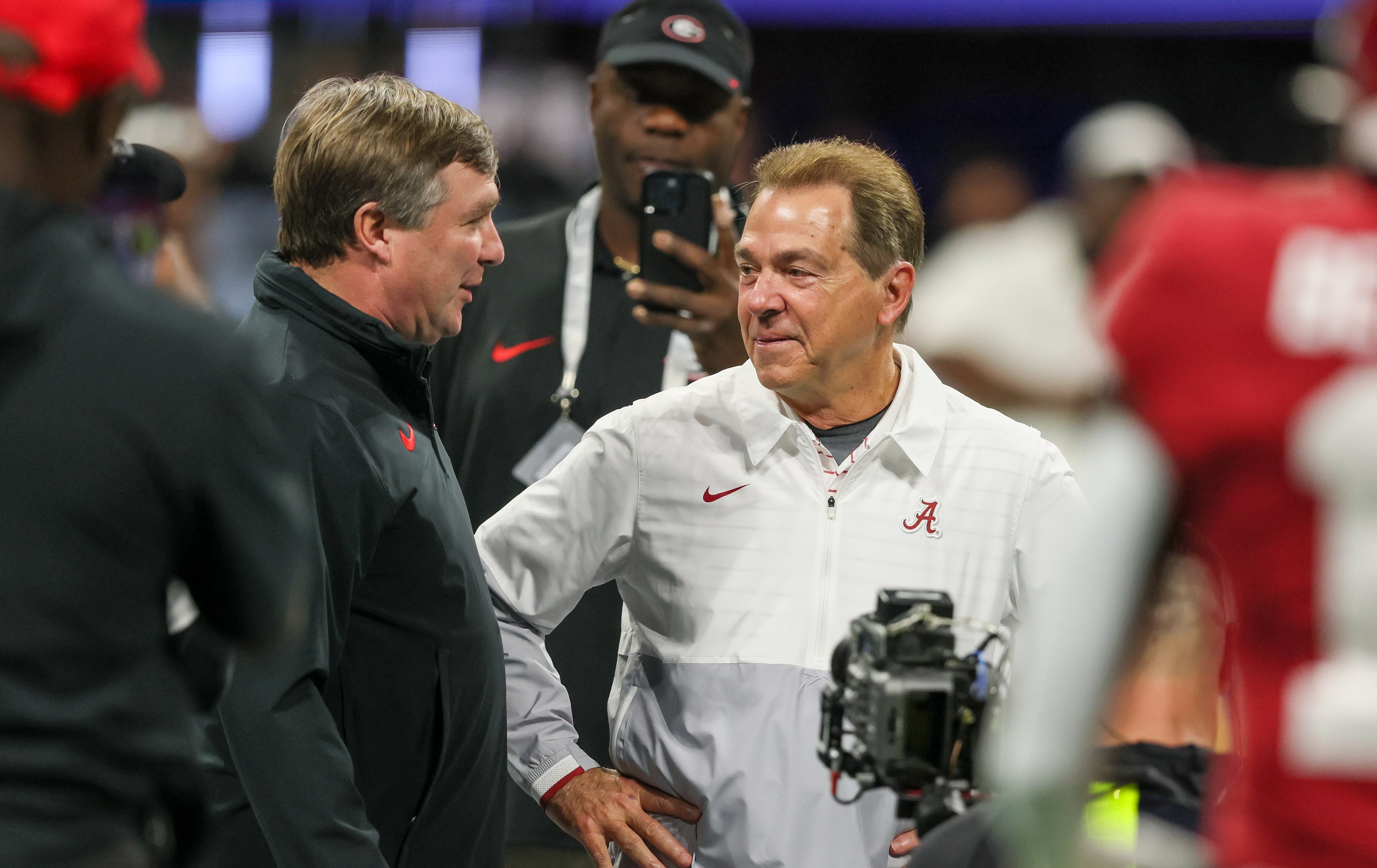Jason Getz's photo of Alabama coach Nick Saban and Georgia coach Kirby Smart prior to the 2023 SEC championship game at Mercedes-Benz Stadium.