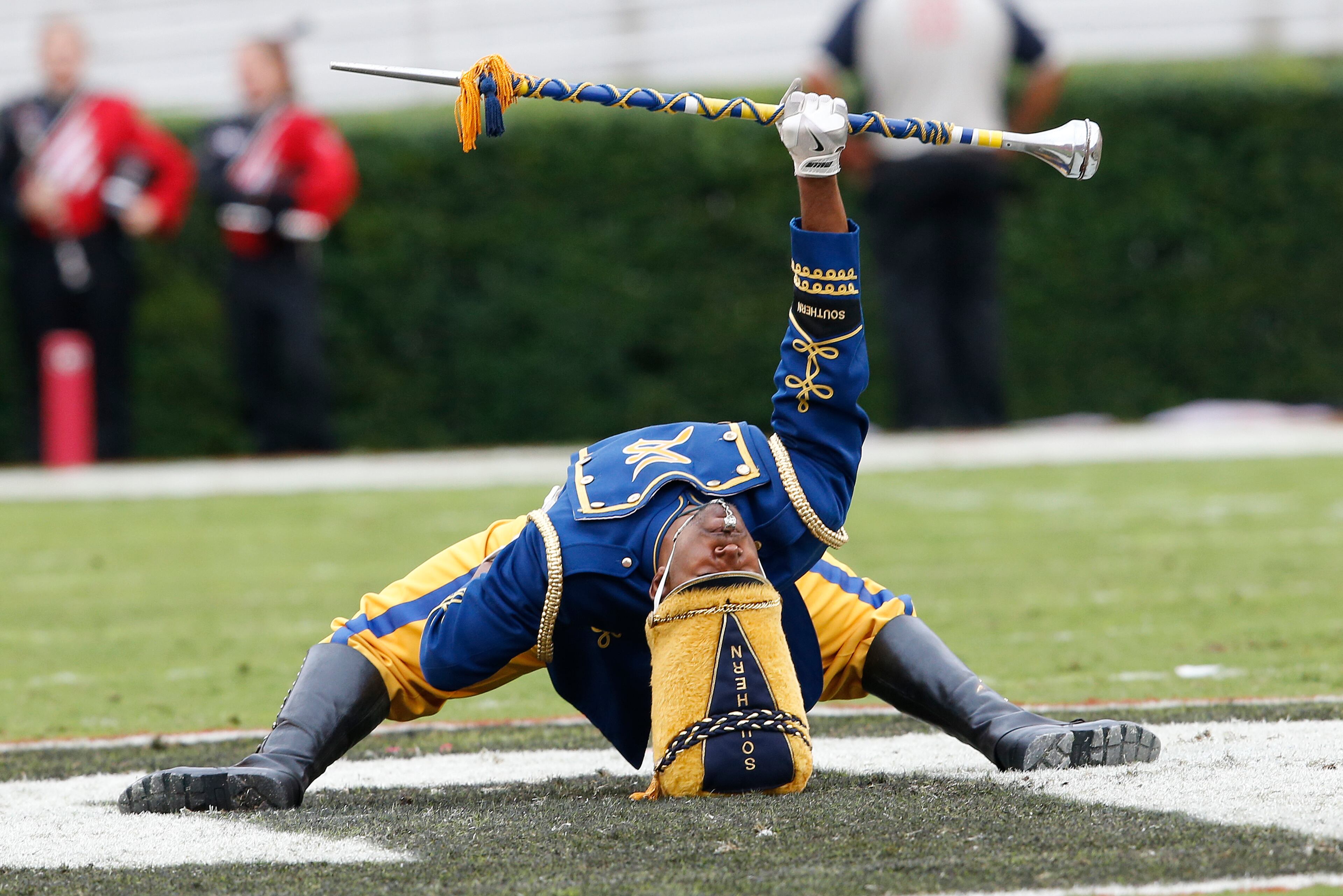 Southern drum major Keith Morgan, of New Orleans, preforms at halftime in an NCAA college football game against Georgia Saturday, Sept. 26, 2015, in Athens, Ga. (AP Photo/John Bazemore)