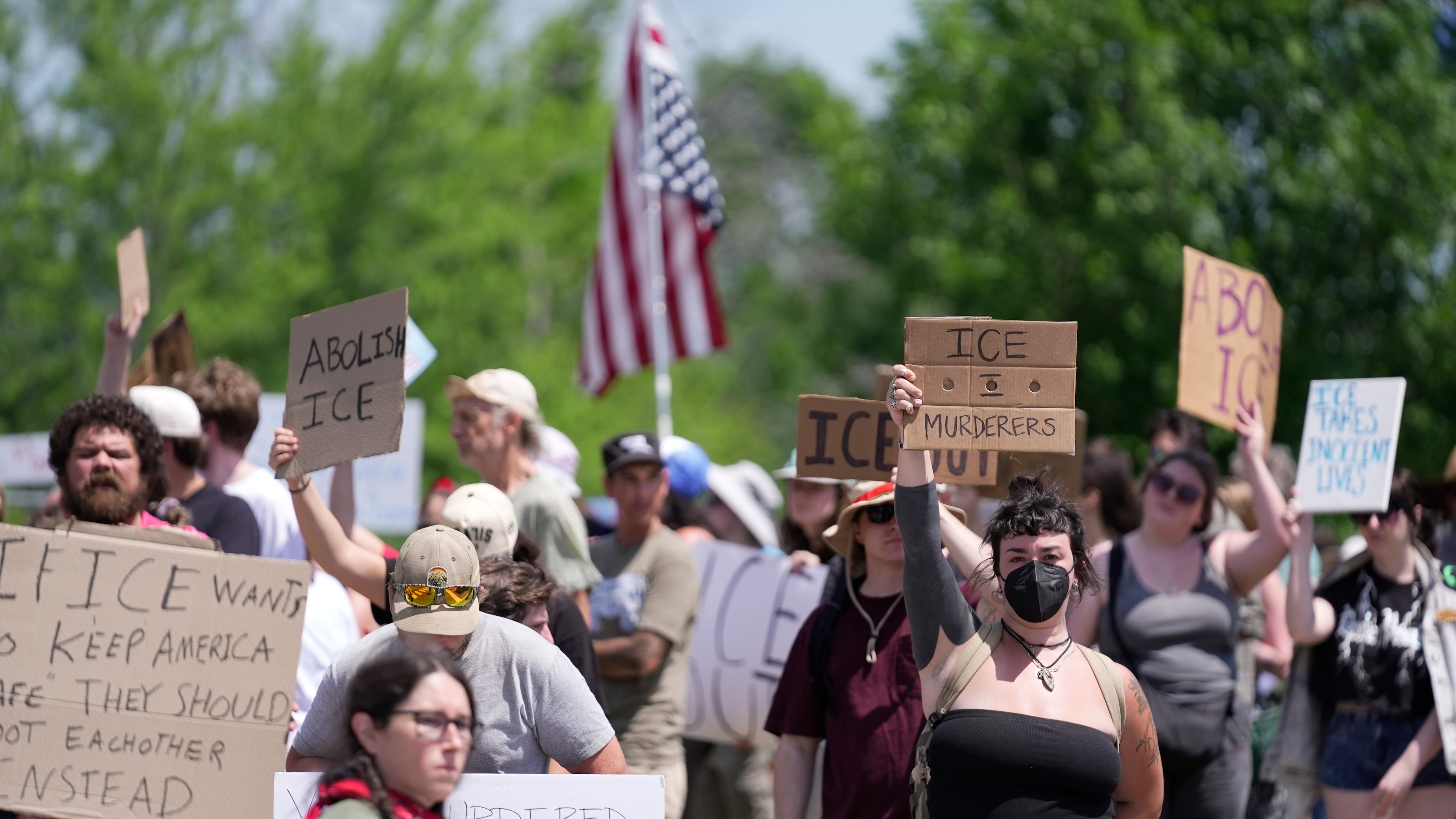 Protesters gather near the scene of a shooting involving U.S. Immigration and Customs Enforcement, Monday, July 13, 2026 in Biddeford, Maine. (AP Photo/Robert F. Bukaty)