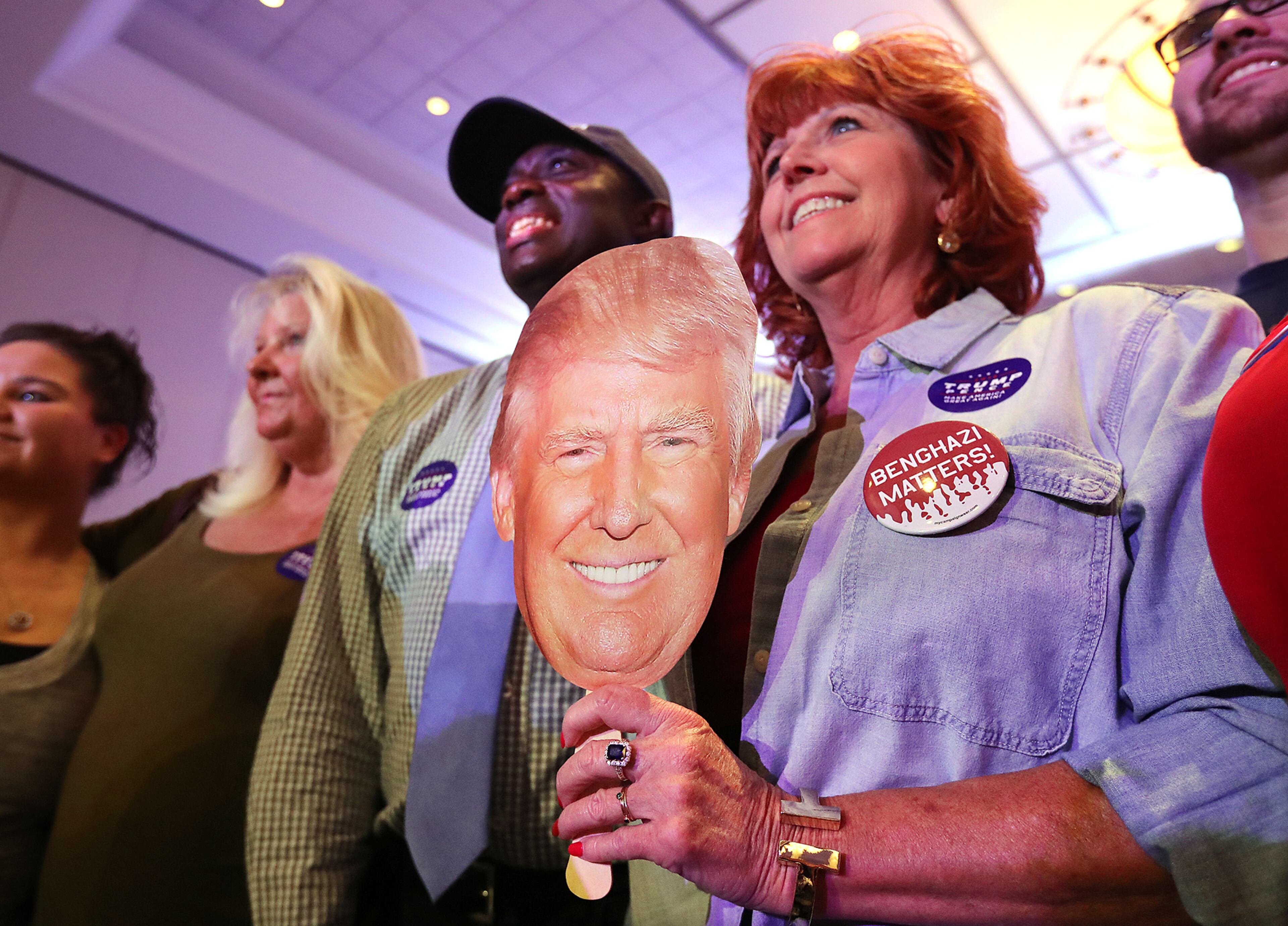 Lyn Murphy shows her support for Donald Trump at vice presidential candidate Mike Pence's campaign stop in Marietta on Monday, August 29, 2016. Curtis Compton /ccompton@ajc.com