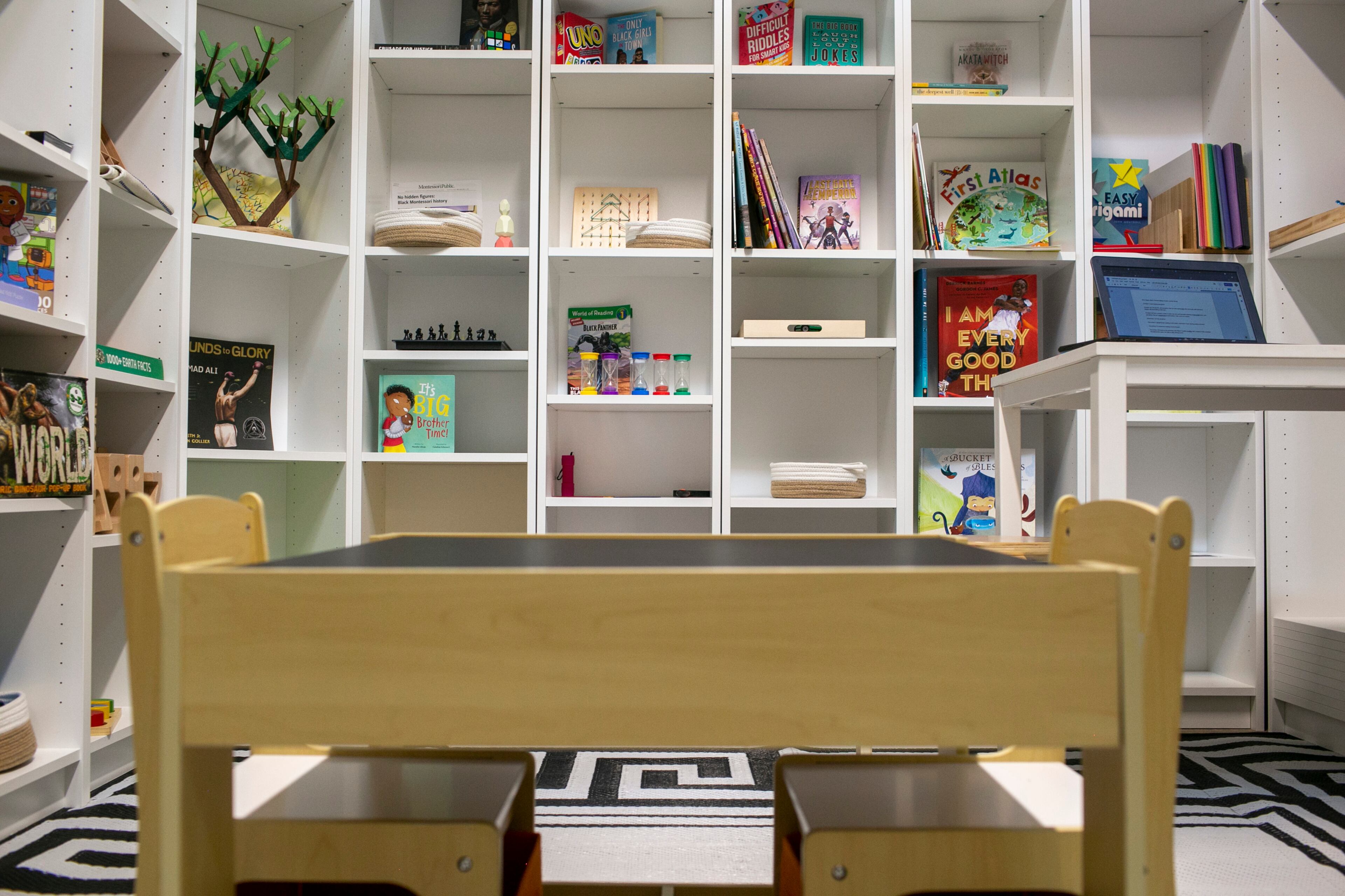 Children’s books are seen on shelves at Makeisha Robey’s space The Happy Black Parent in the Nia Building at Pittsburgh Yards, a professional and maker space near Adair Park, Capitol Gateway, Mechanicsville, Peoplestown, Pittsburgh and Summerhill neighborhoods in southwest Atlanta on Tuesday, September 7, 2021. (Rebecca Wright for the Atlanta Journal-Constitution)