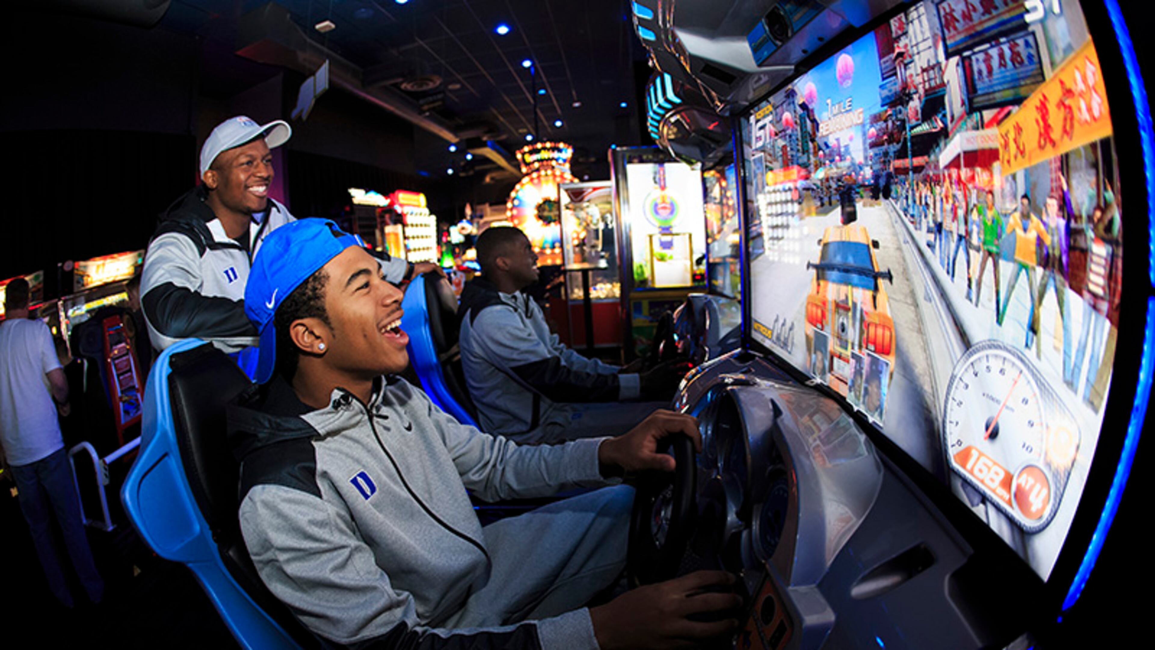 Duke players enjoyed some laughs in the Dave & Buster's game room.