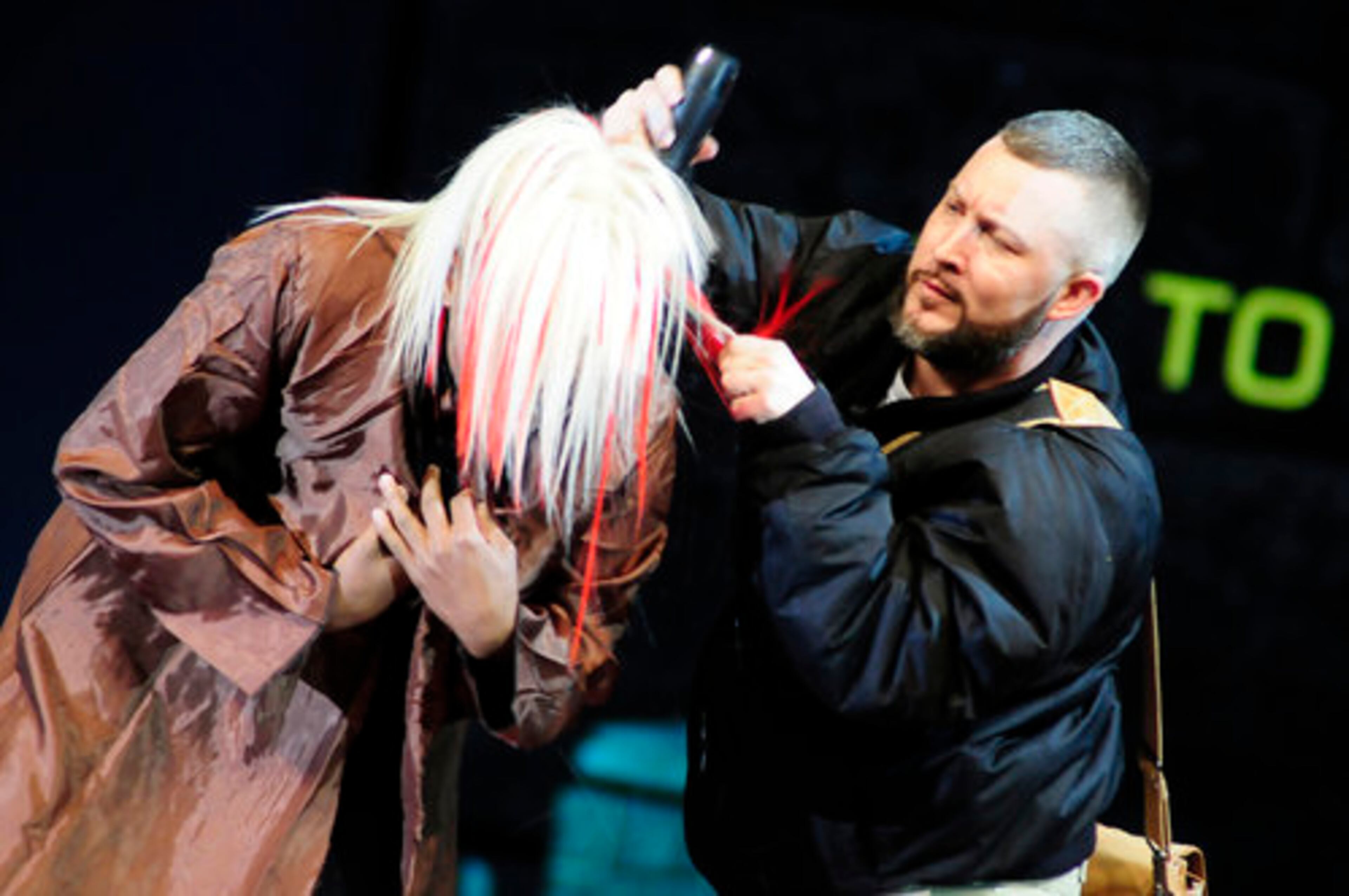 David Hiland demonstrates his skills during the barber battle.