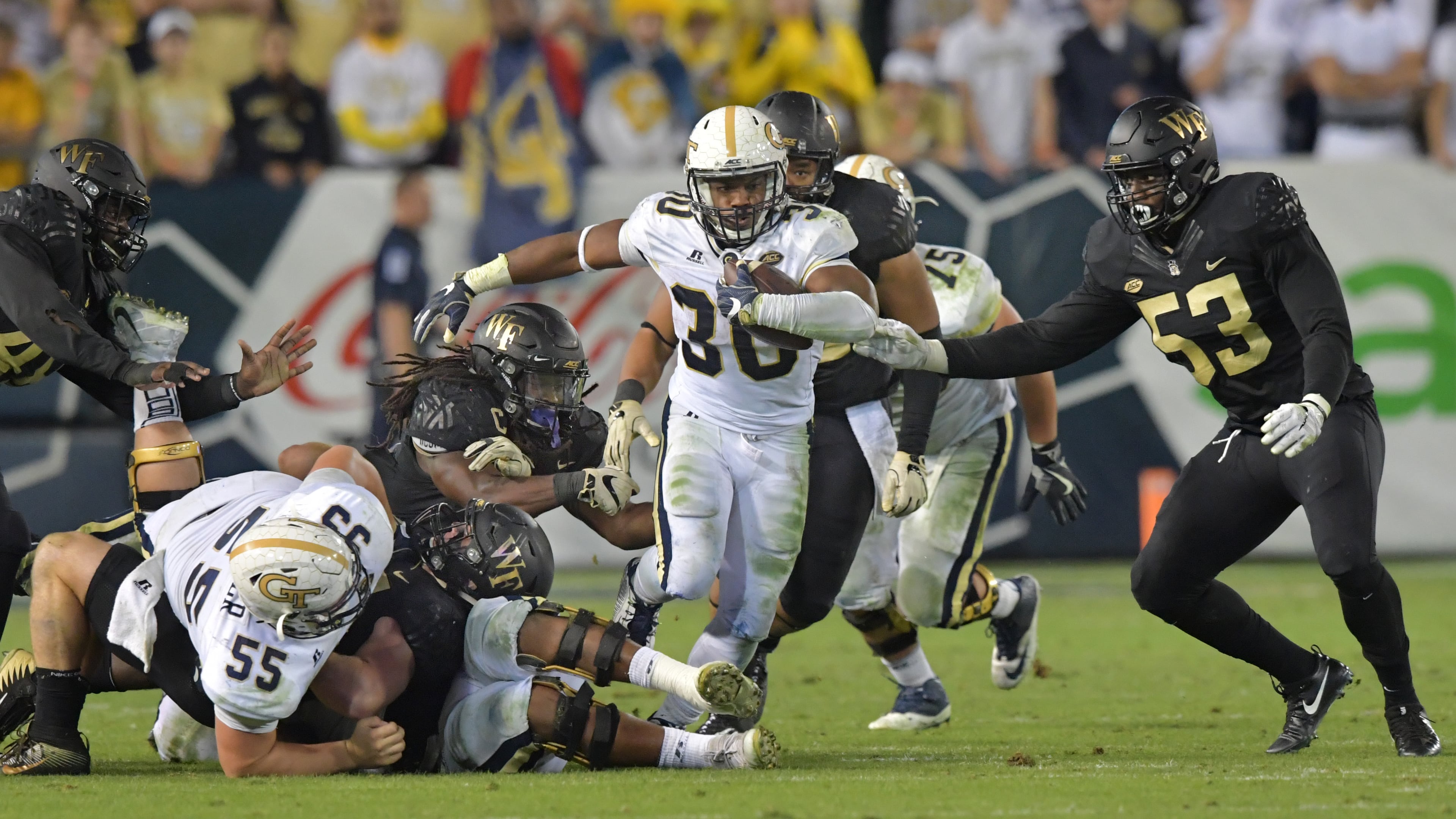 October 21, 2017 Atlanta - Georgia Tech running back KirVonte Benson (30) runs with the ball in the first half of an NCAA college football game at Bobby Dodd Stadium on Saturday, October 21, 2017. HYOSUB SHIN / HSHIN@AJC.COM