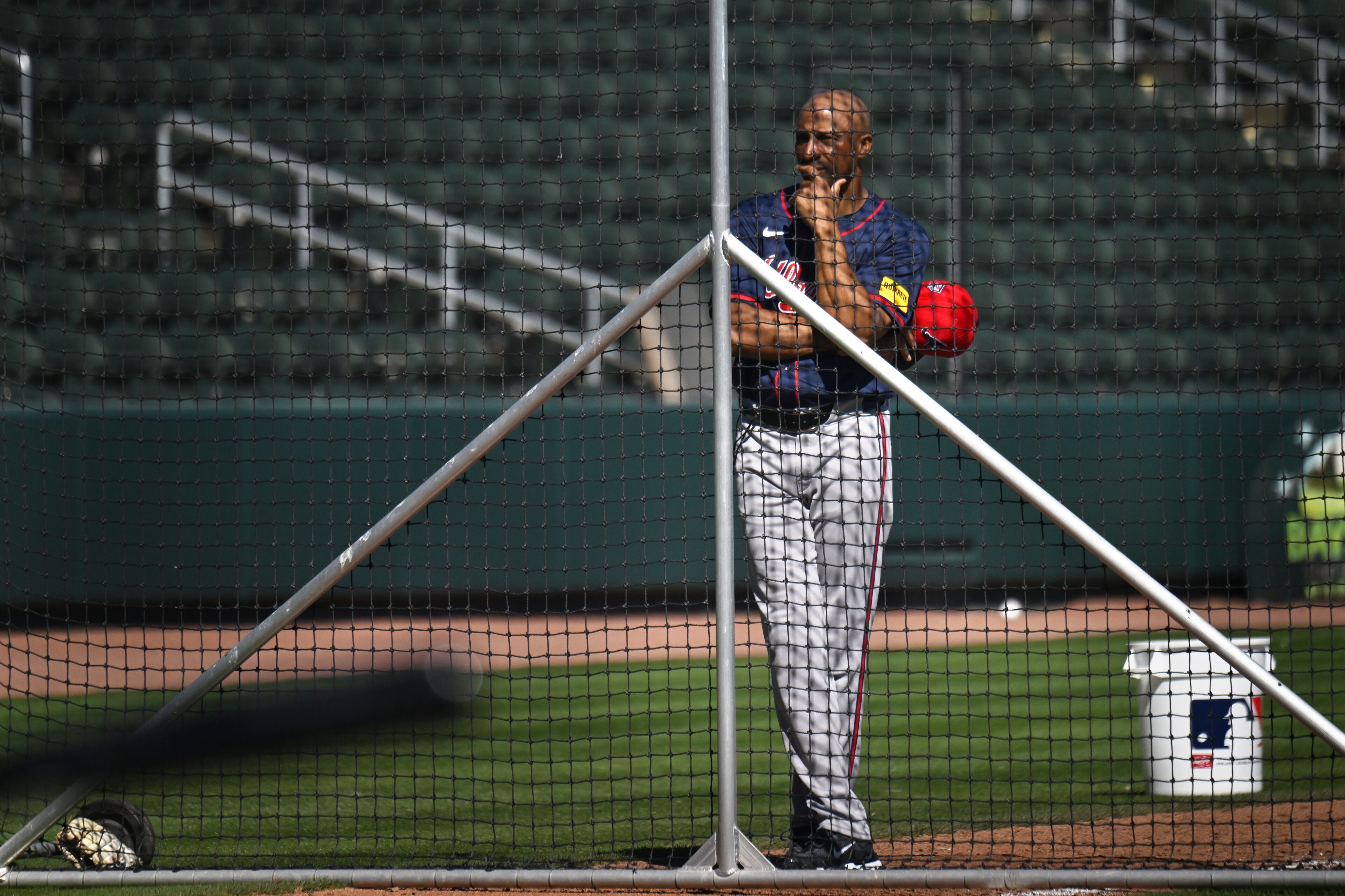 Atlanta Braves first base coach Tom Goodwin watches batting practice during spring training workouts at CoolToday Park, Thursday, Feb. 22, 2024, in North Port, Florida. (Hyosub Shin / Hyosub.Shin@ajc.com)
