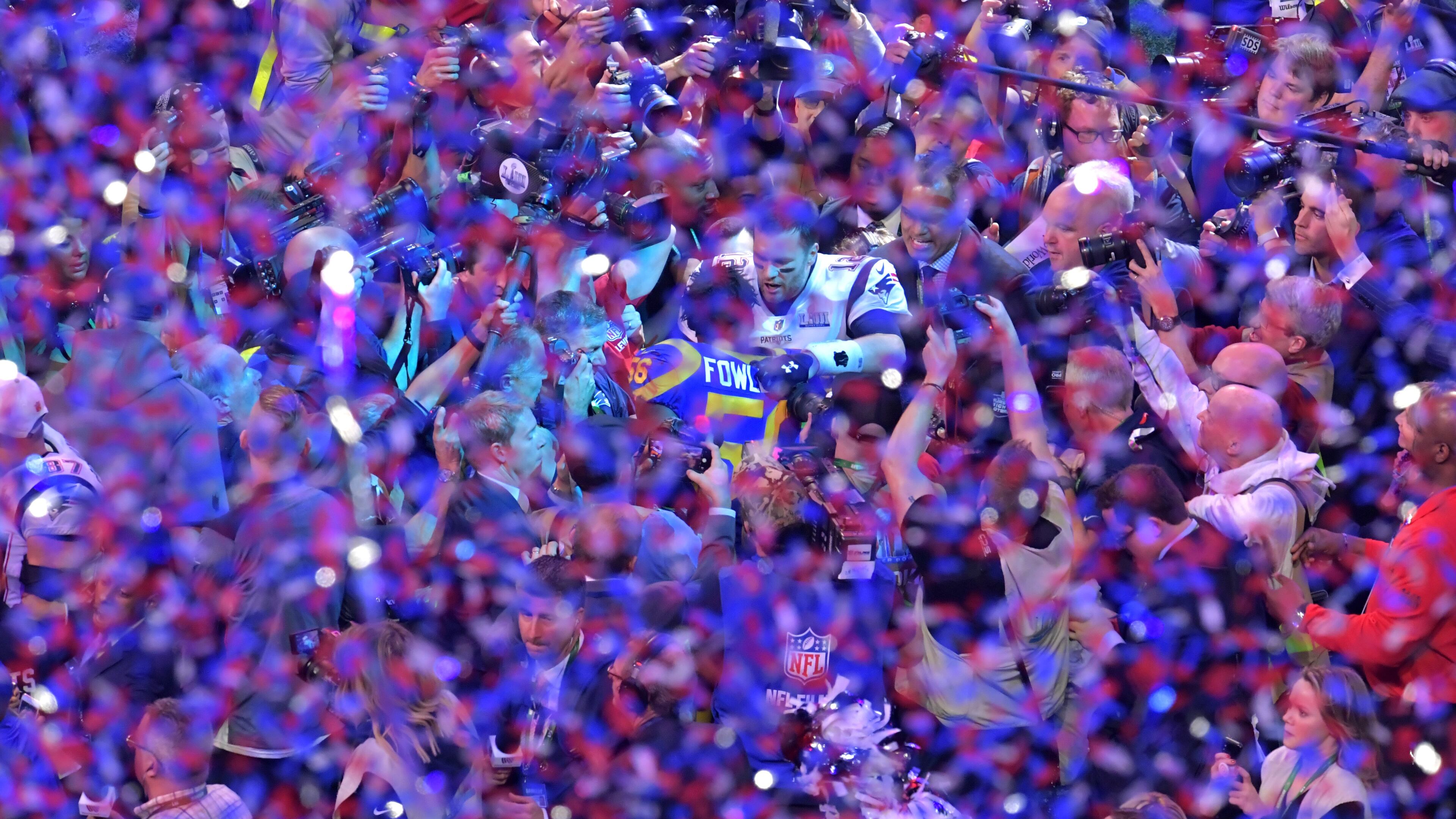 February 3, 2019 Atlanta - New England Patriots quarterback Tom Brady (12) greets Los Angeles Rams linebacker Dante Fowler (56) after New England Patriots won over the Los Angeles Rams during Super Bowl LIII at the Mercedes-Benz Stadium on Saturday, February 3, 2019. HYOSUB SHIN / HSHIN@AJC.COM