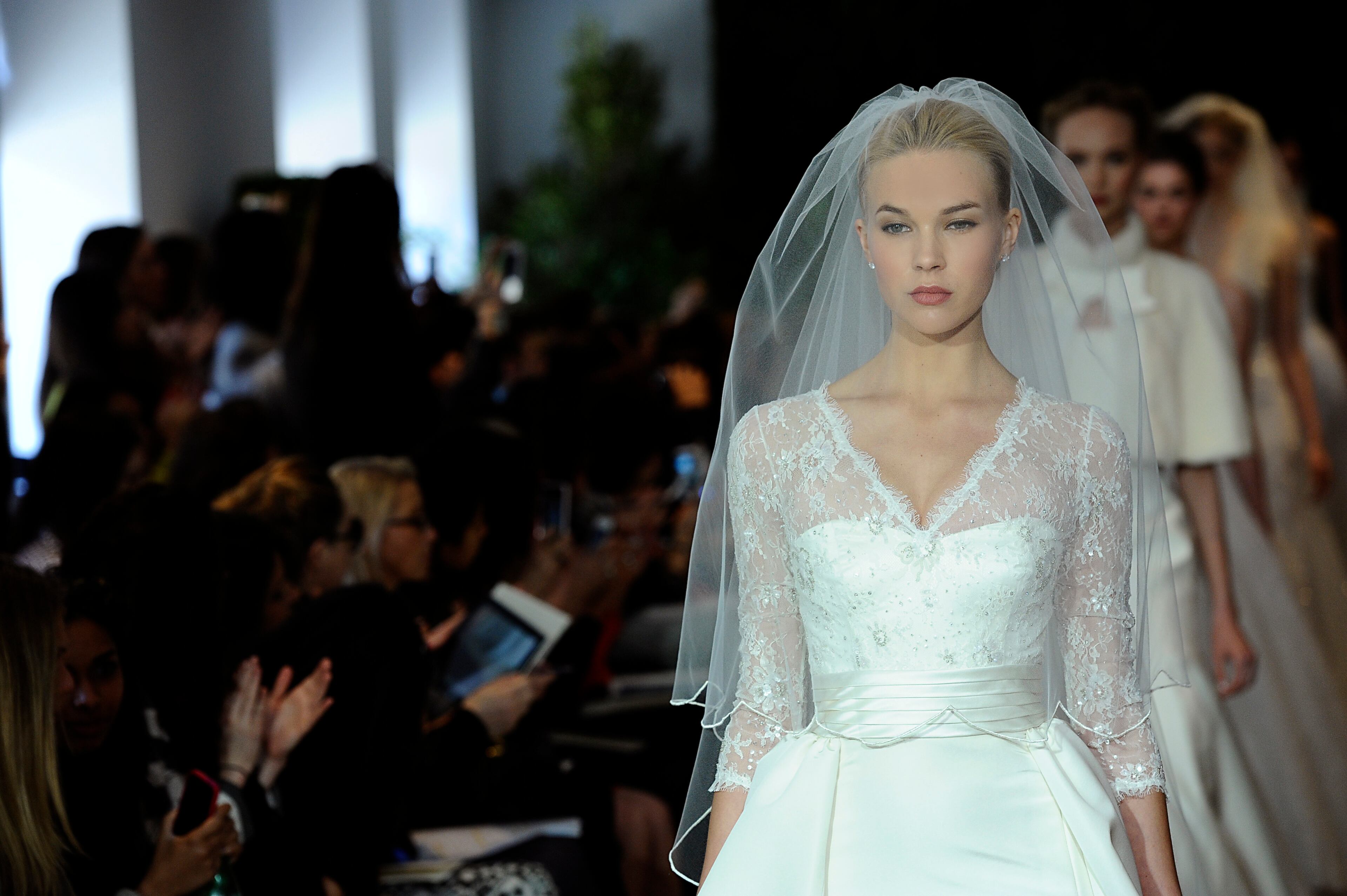 NEW YORK, NY - APRIL 21: A model walks the runway during the Carolina Herrera 2014 Bridal Spring/Summer collection show on April 21, 2013 in New York City. (Photo by Fernanda Calfat/Getty Images)