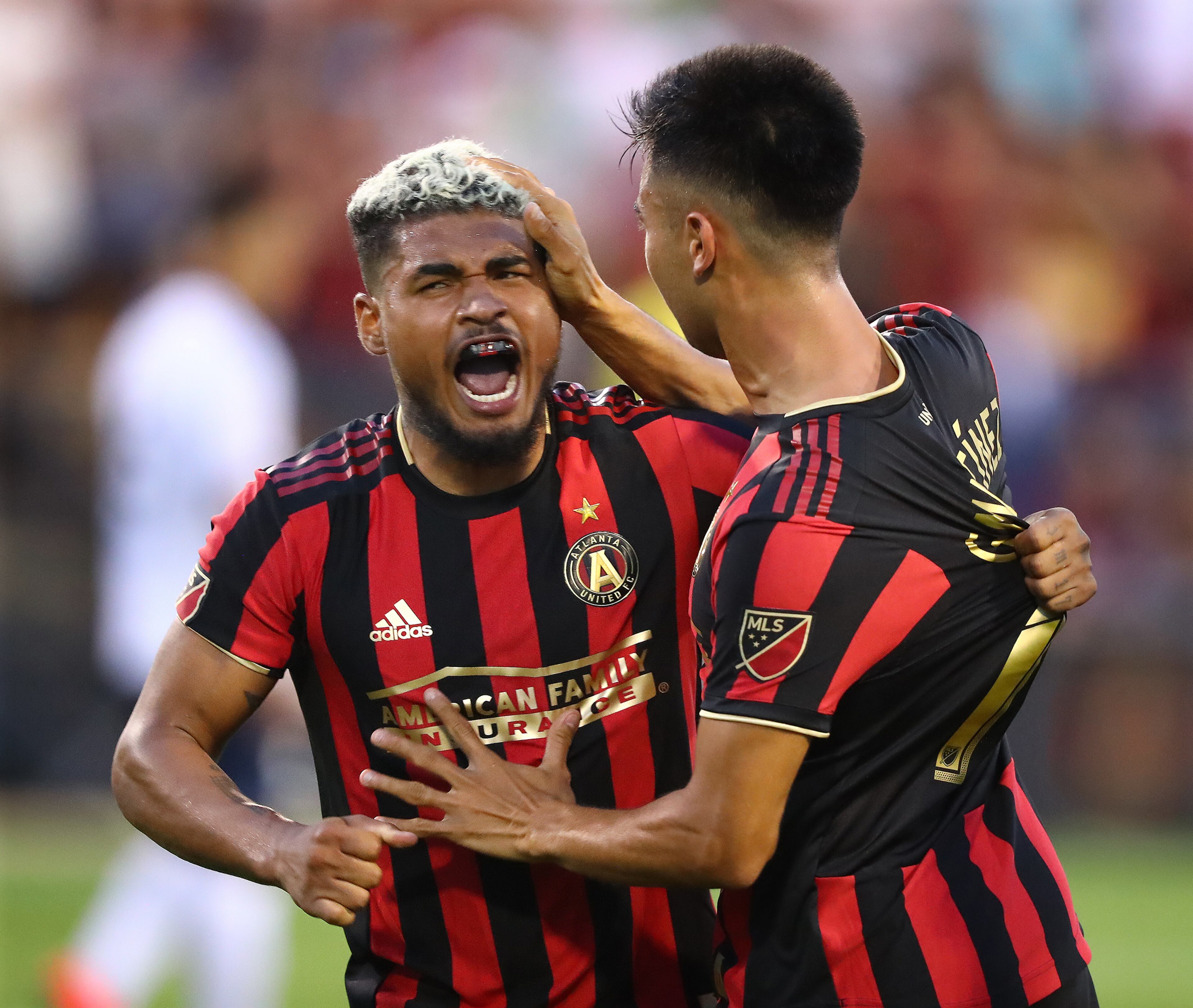 Atlanta United forward Josef Martinez celebrates with Gonzalo Martinez after a goal against St. Louis for a 1-0 lead in their U.S. Open Cup quarterfinals soccer match on Wednesday in Kennesaw. Josef Martinez scored a goal later in stoppage for a 2-0 victory over St. Louis. Curtis Compton/ccompton@ajc.com